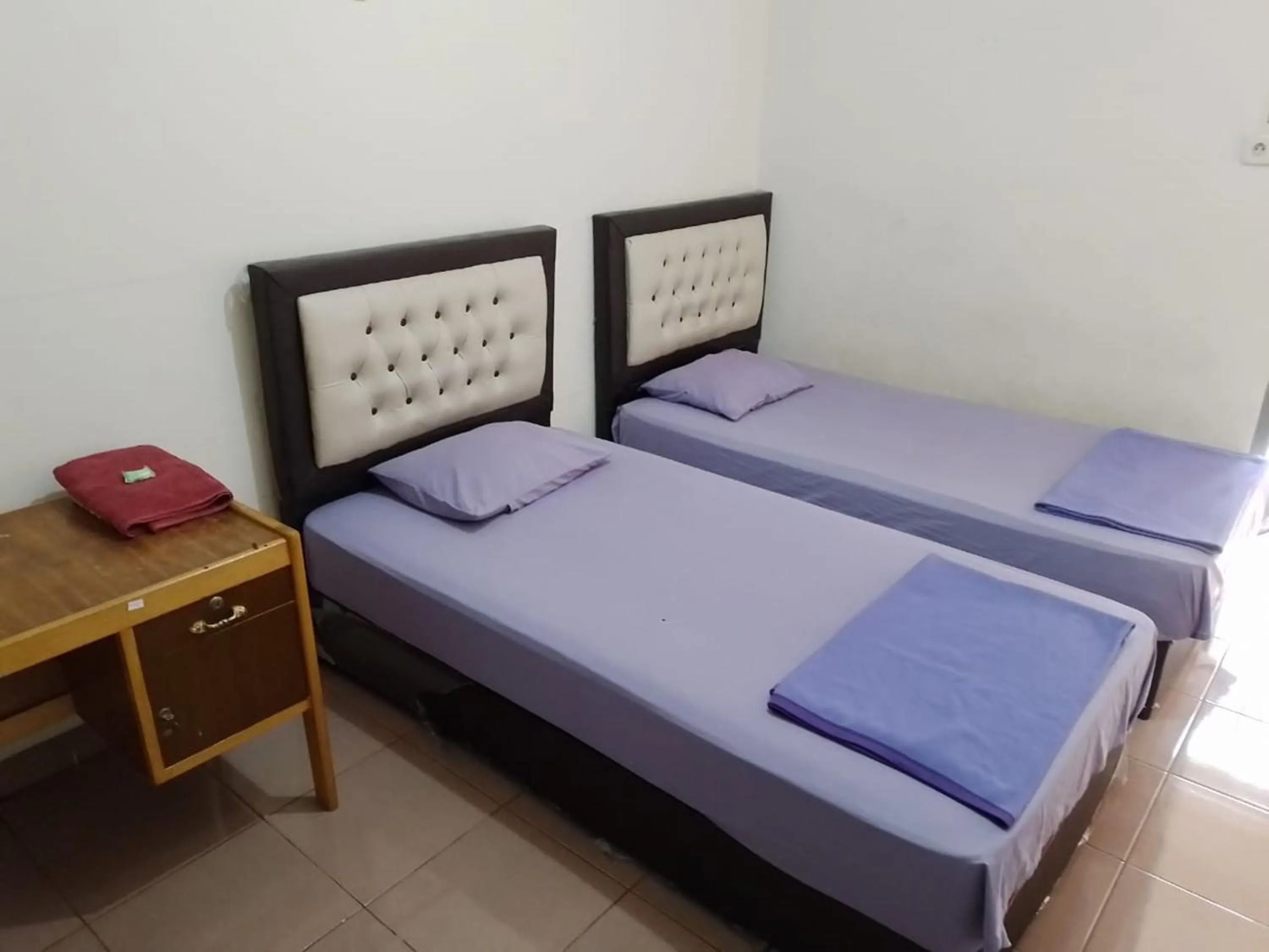 Bed in Penginapan Syariah