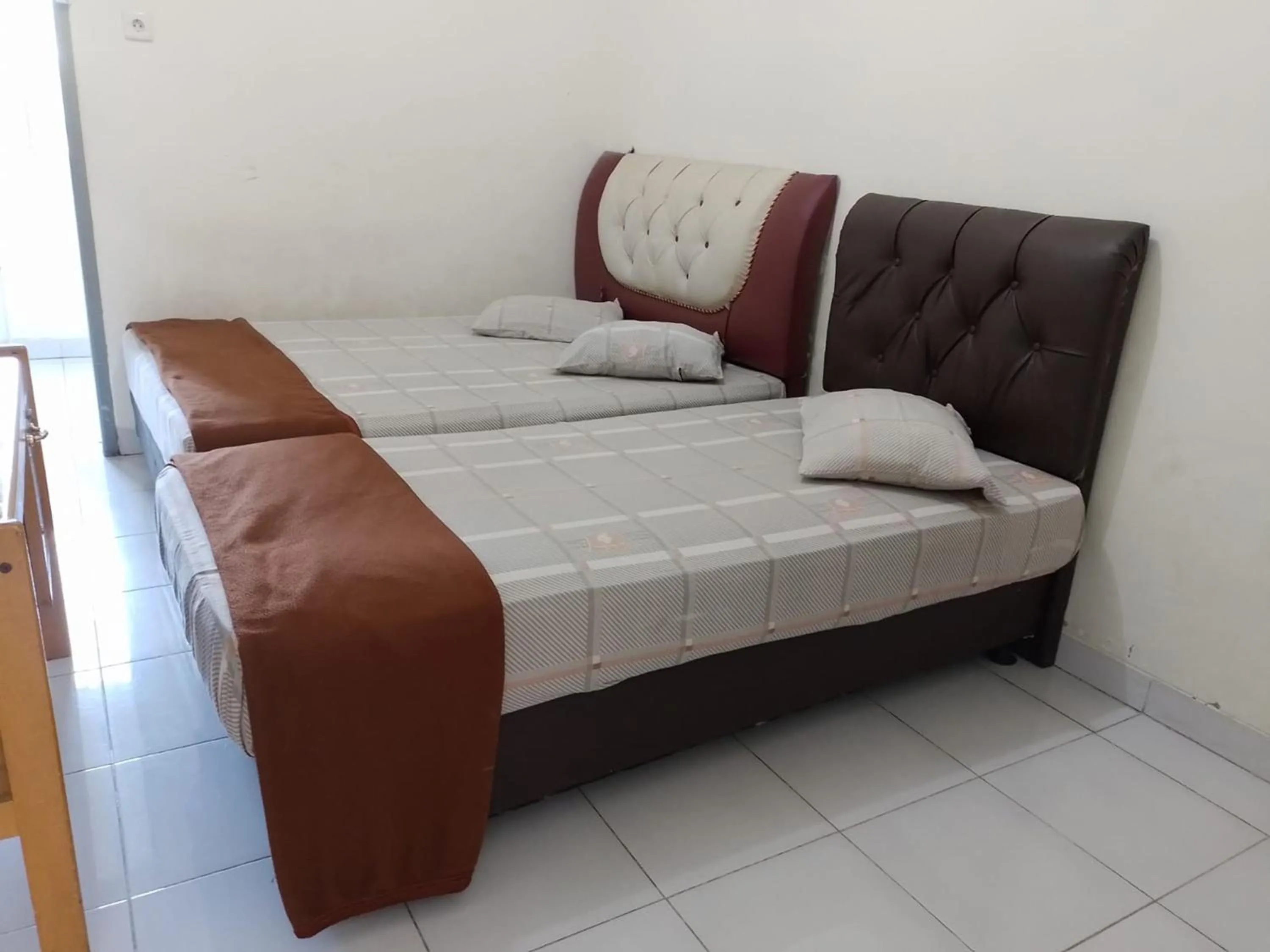 Bed in Penginapan Syariah