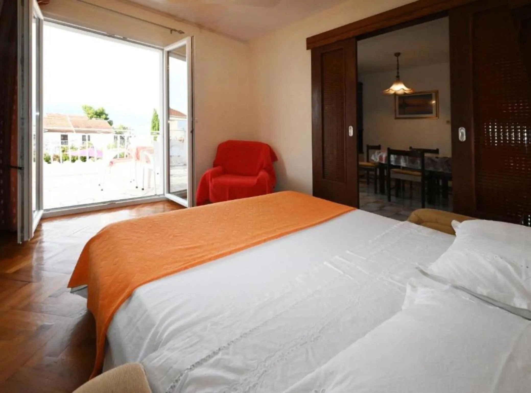 Bedroom, Bed in Apartments Mihovilovic - 50 m from beach