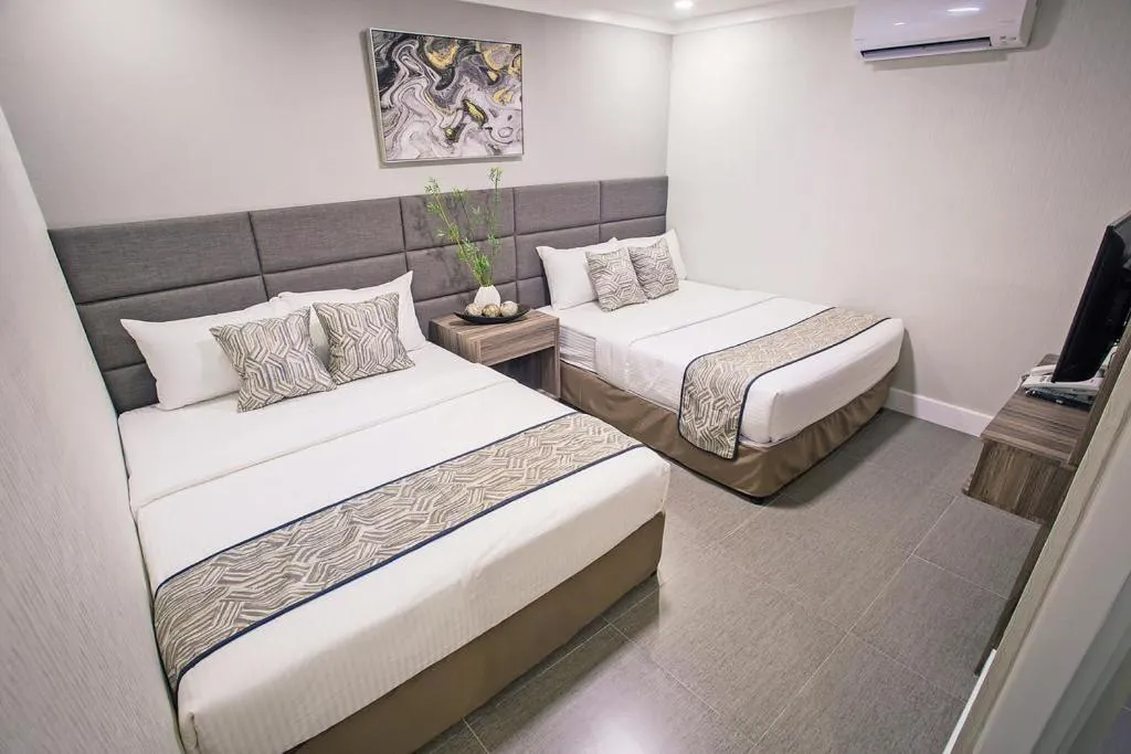 Bed in Anika Suites
