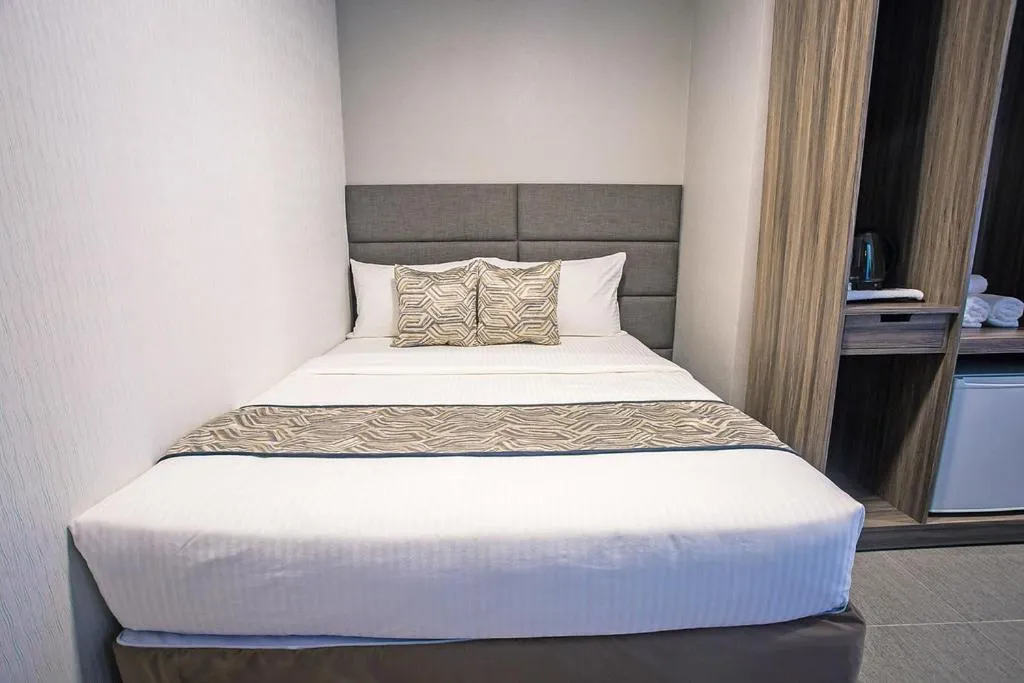 Bed in Anika Suites