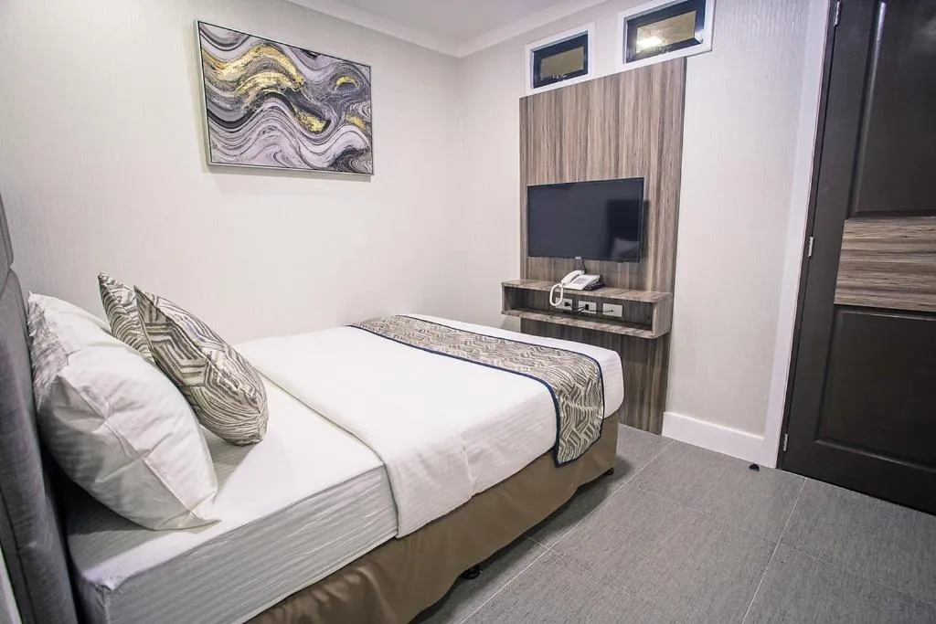 TV and multimedia, Bed in Anika Suites