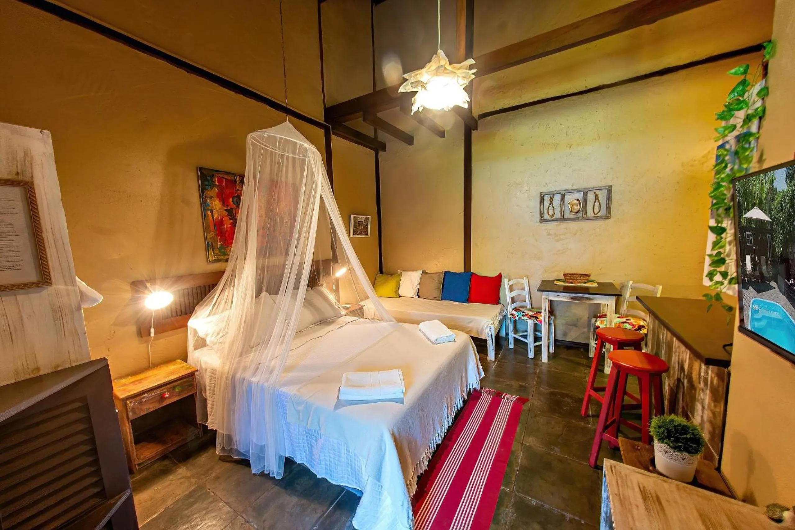 View (from property/room), Bed in Pousada Rosa da Praia - Praia do Rosa - SC