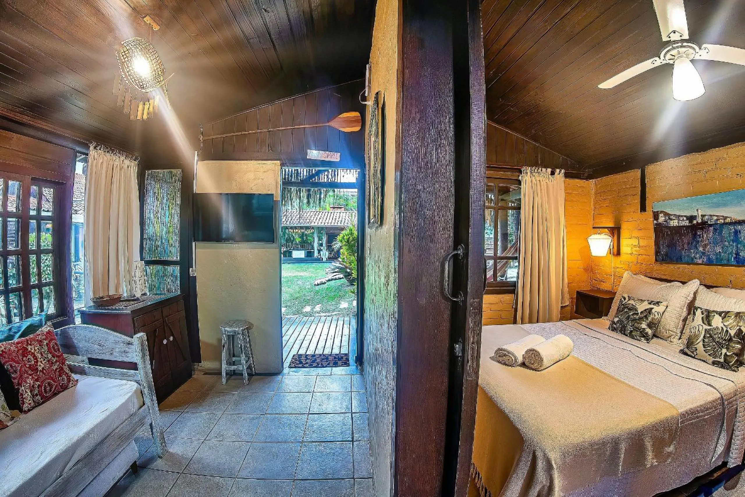 Living room, Bed in Pousada Rosa da Praia - Praia do Rosa - SC