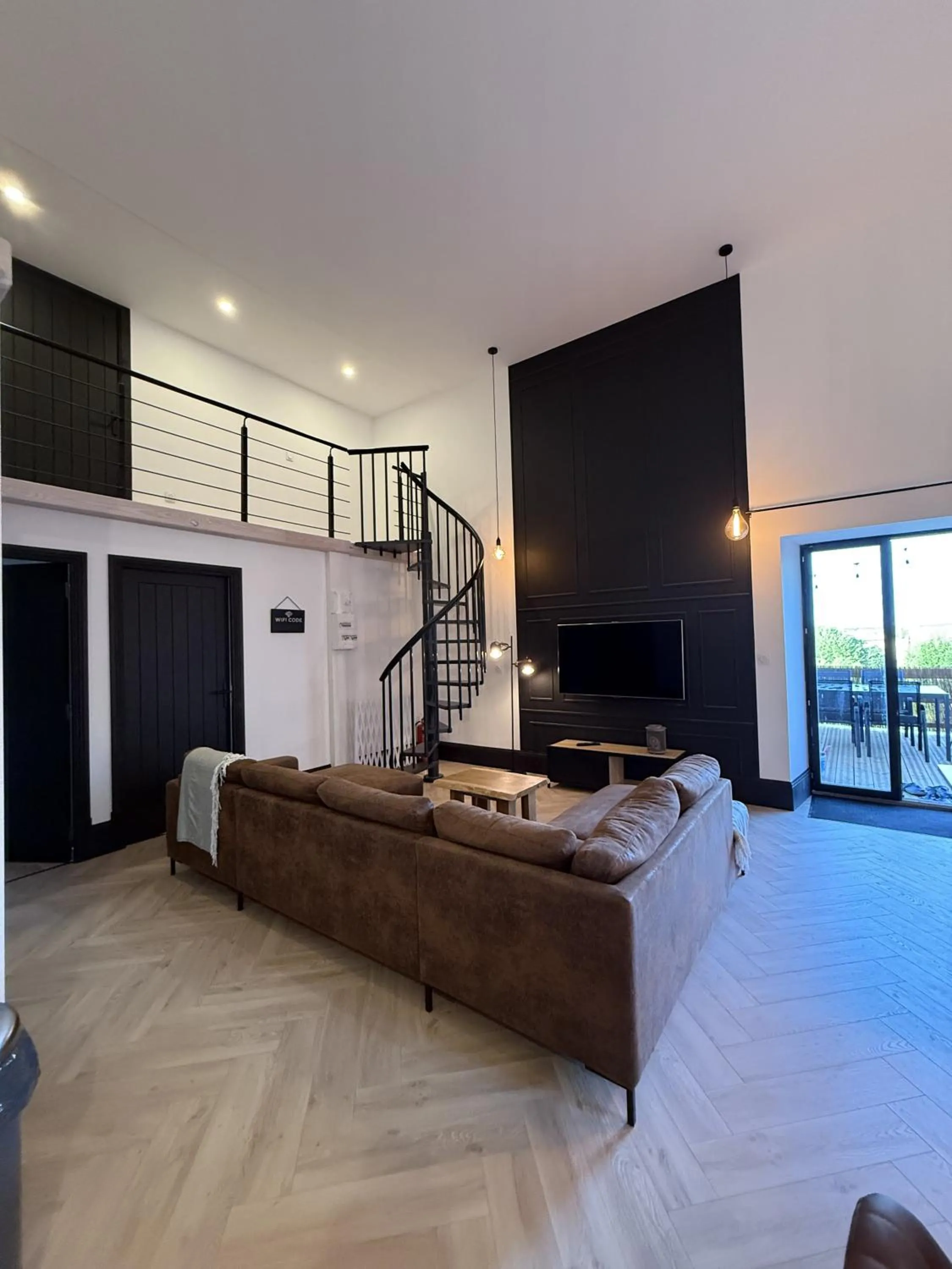 Living room in Gites Le Grand Tornage holiday fun for the whole family
