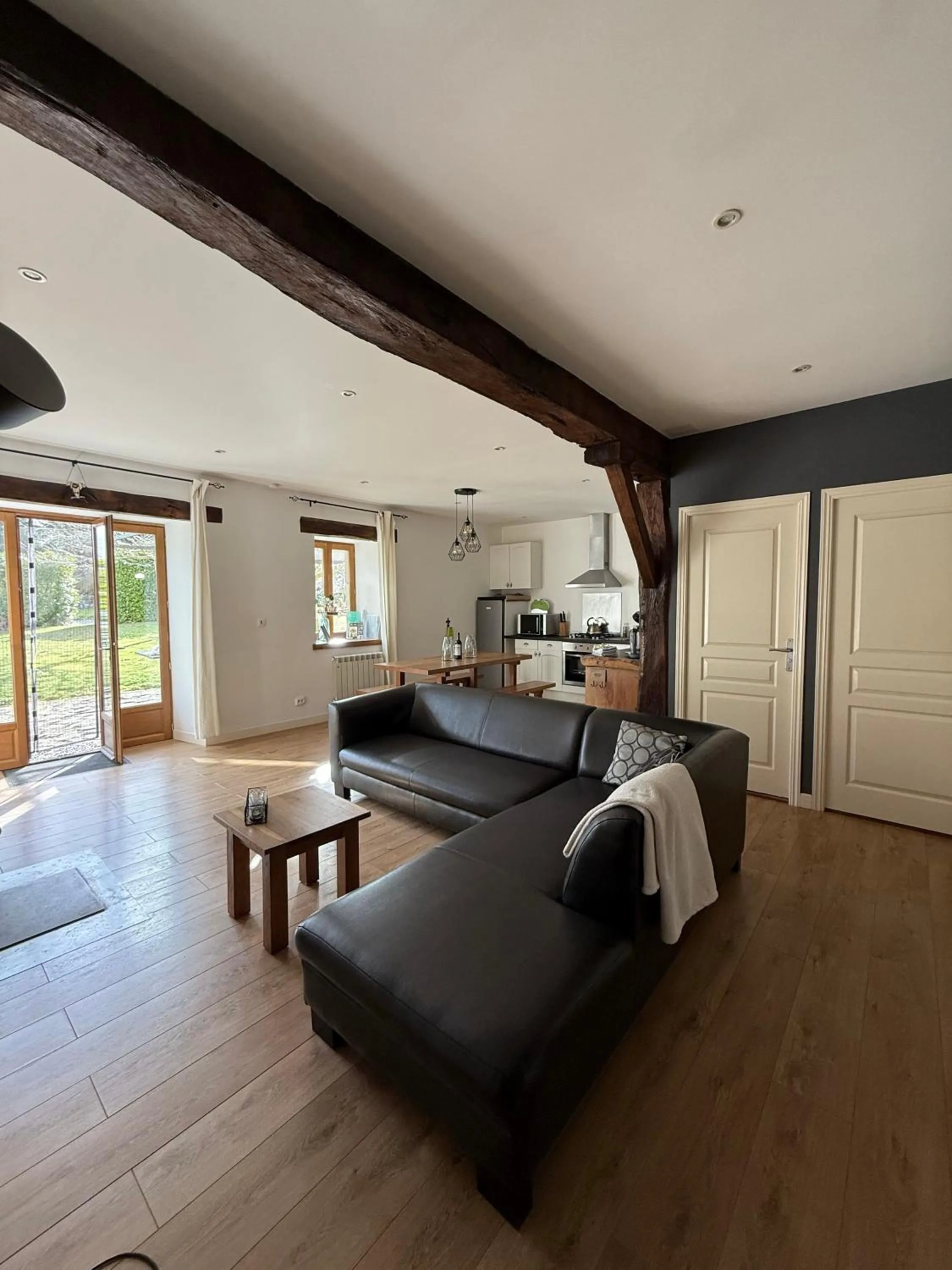 Living room, Bed in Gites Le Grand Tornage holiday fun for the whole family