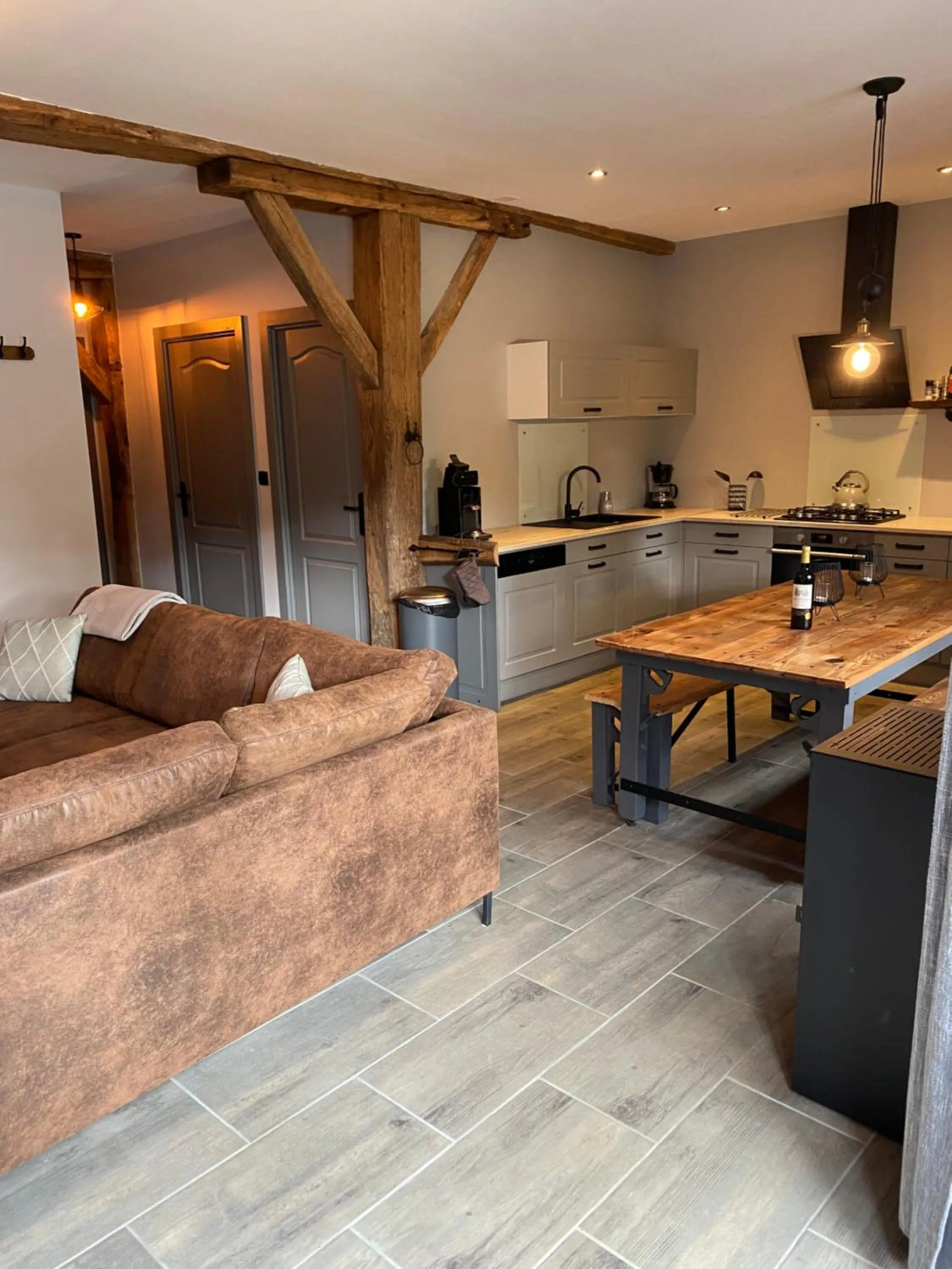 Kitchen or kitchenette in Gites Le Grand Tornage holiday fun for the whole family