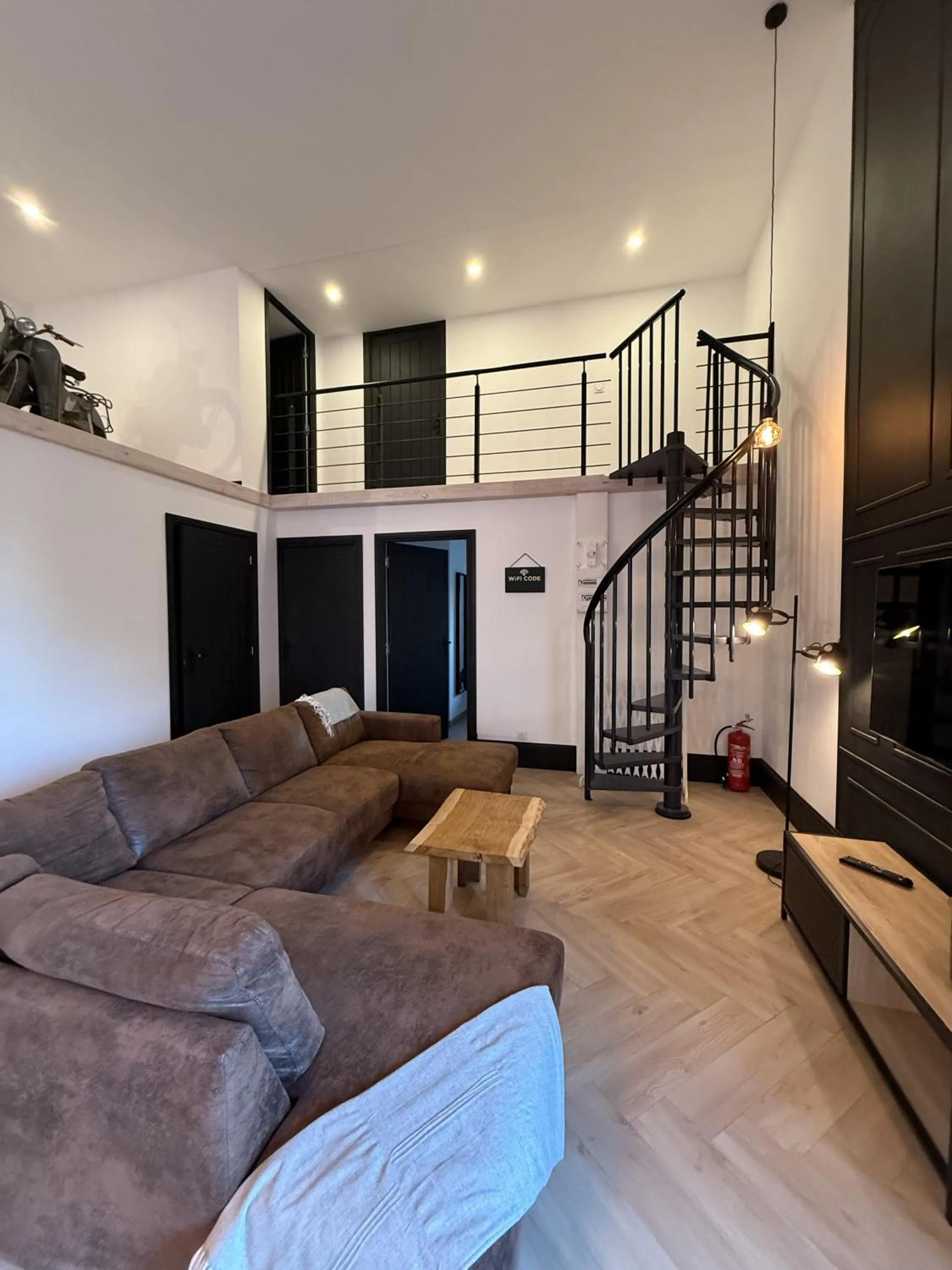 Living room in Gites Le Grand Tornage holiday fun for the whole family