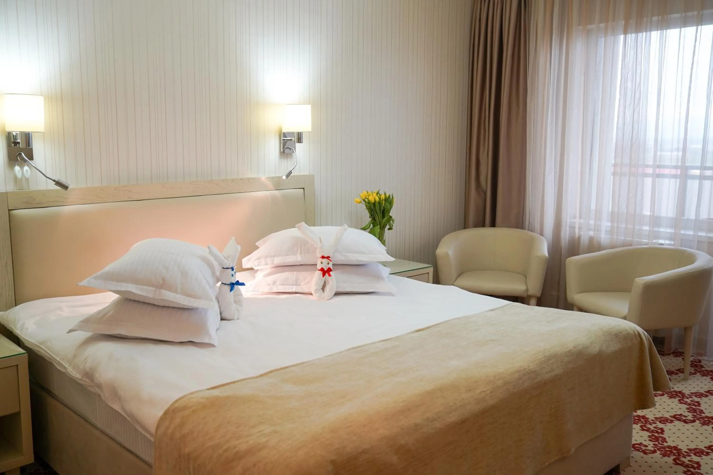 Bed in Caprioara Spa&Wellness Resort