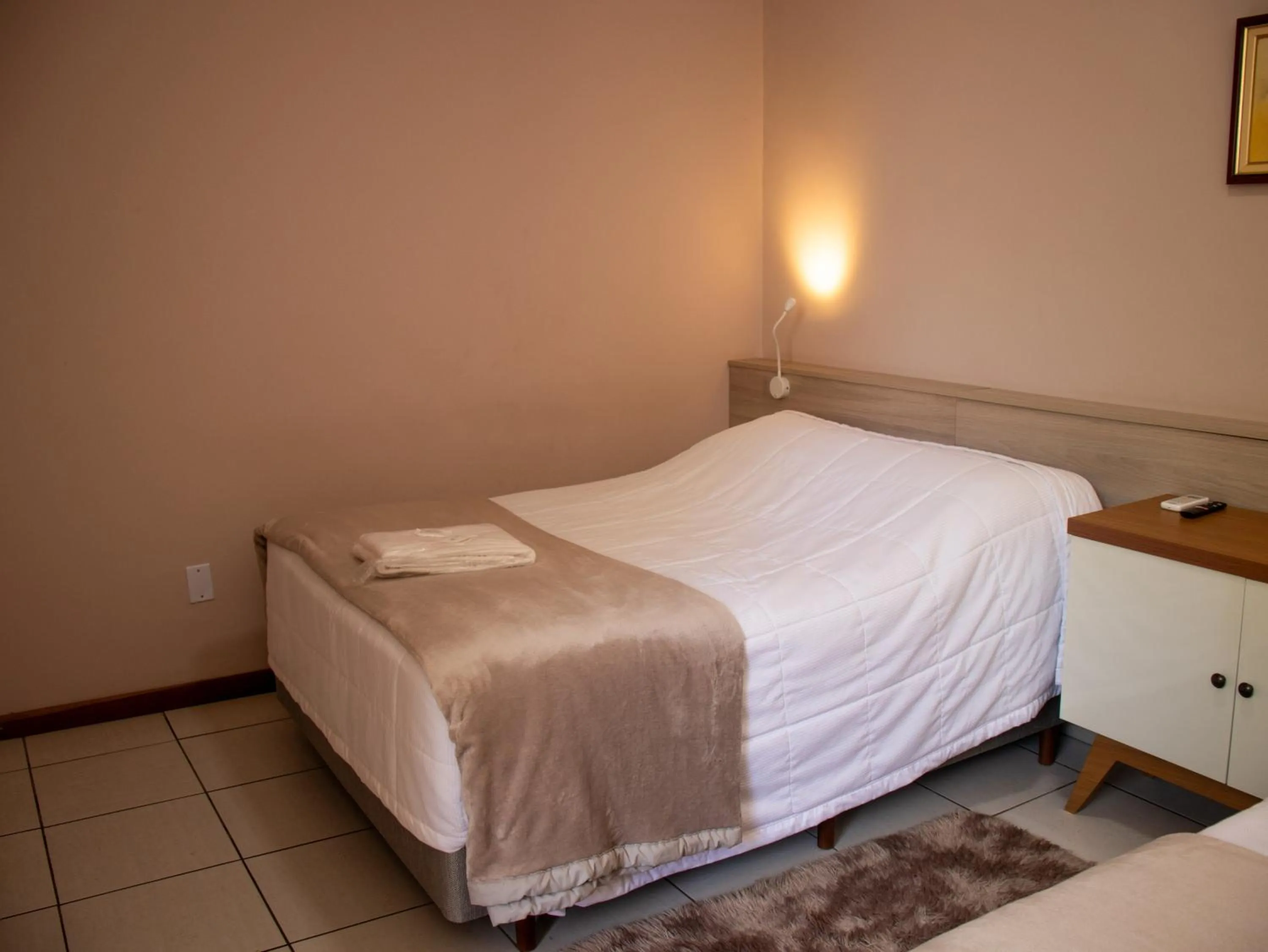 Bed in Hotel Villa Souza Ltda