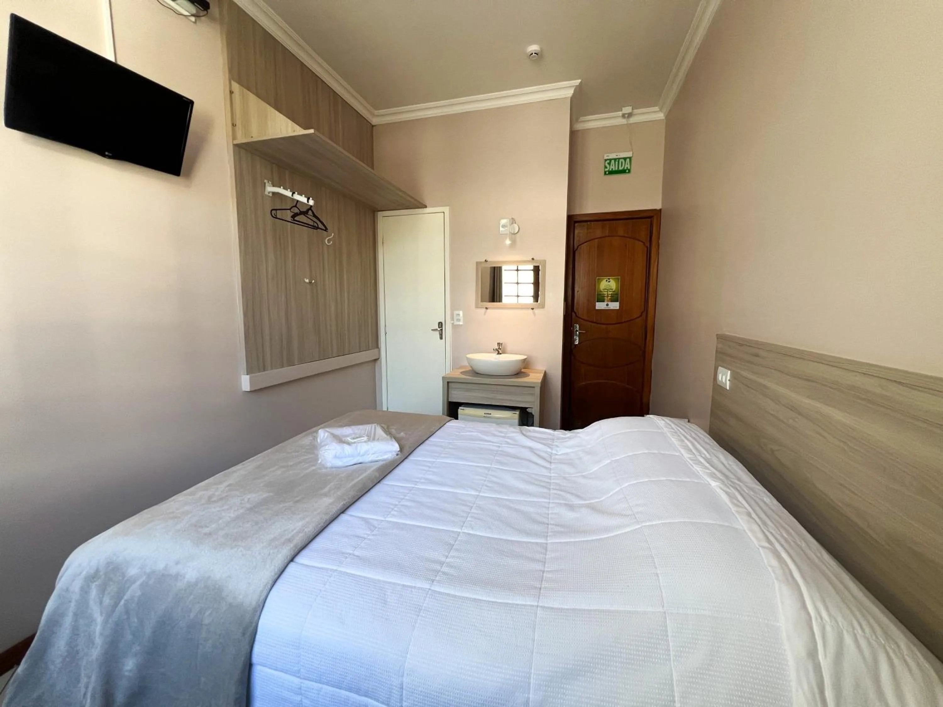 TV and multimedia, Bed in Hotel Villa Souza Ltda