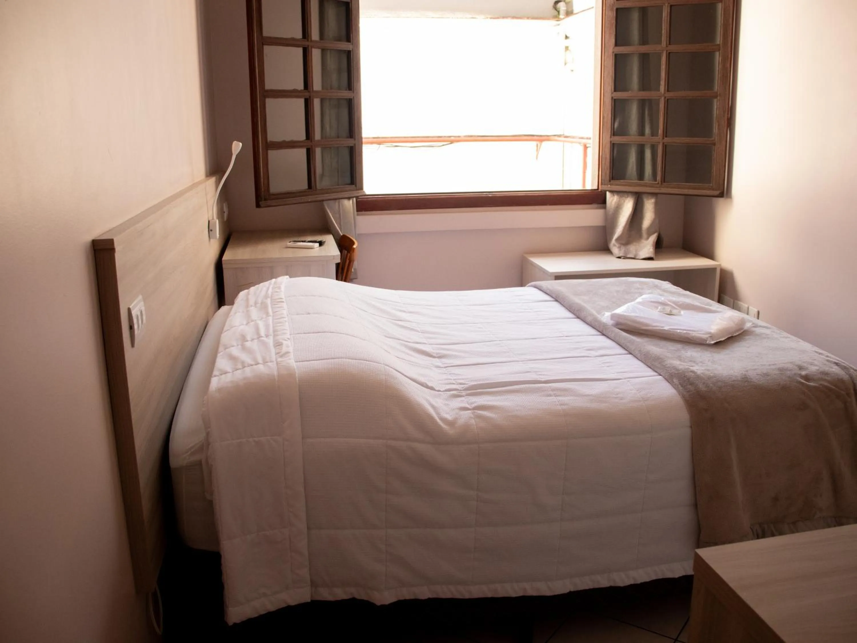 Bed in Hotel Villa Souza Ltda