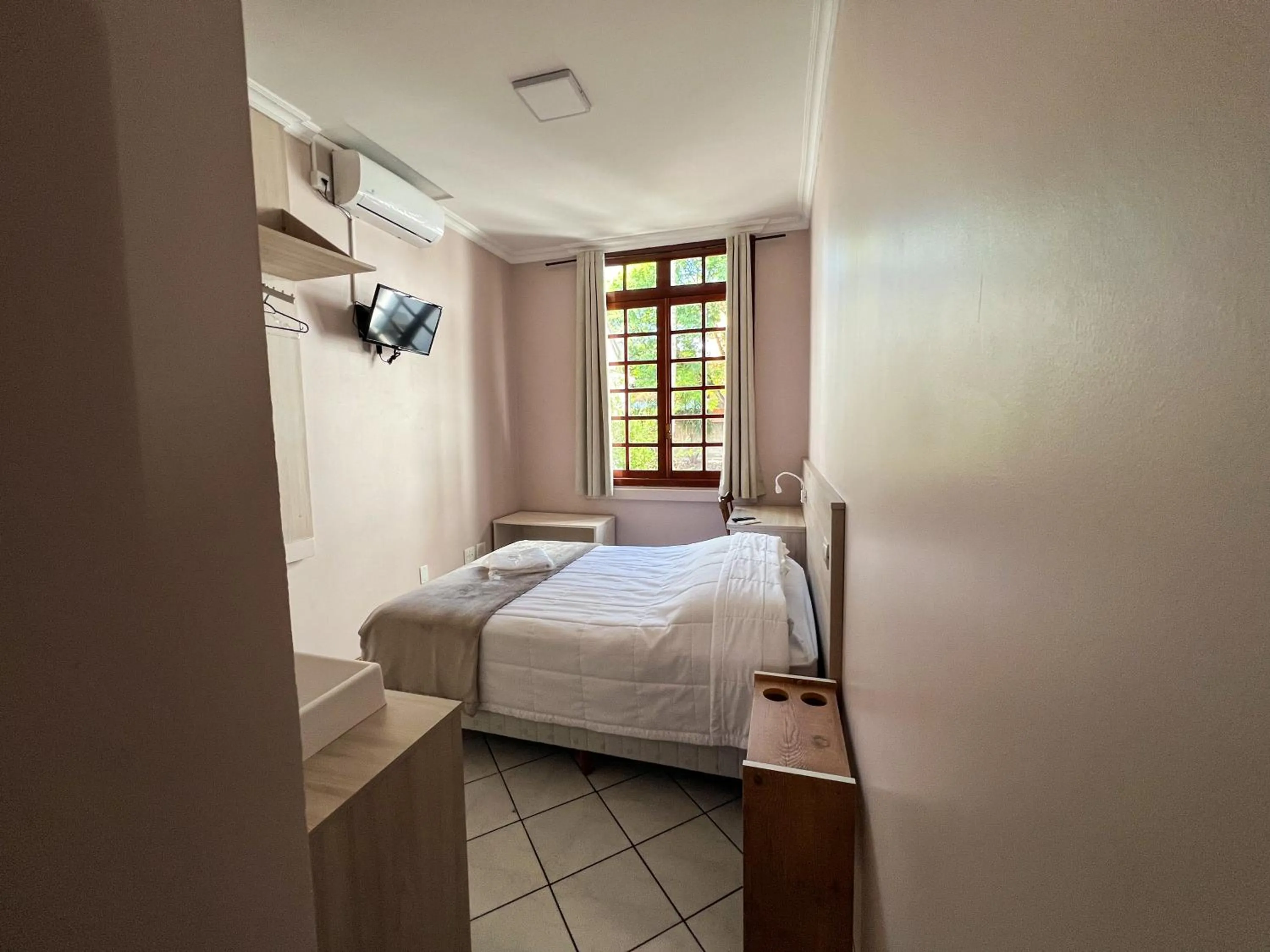 Bedroom, Bed in Hotel Villa Souza Ltda