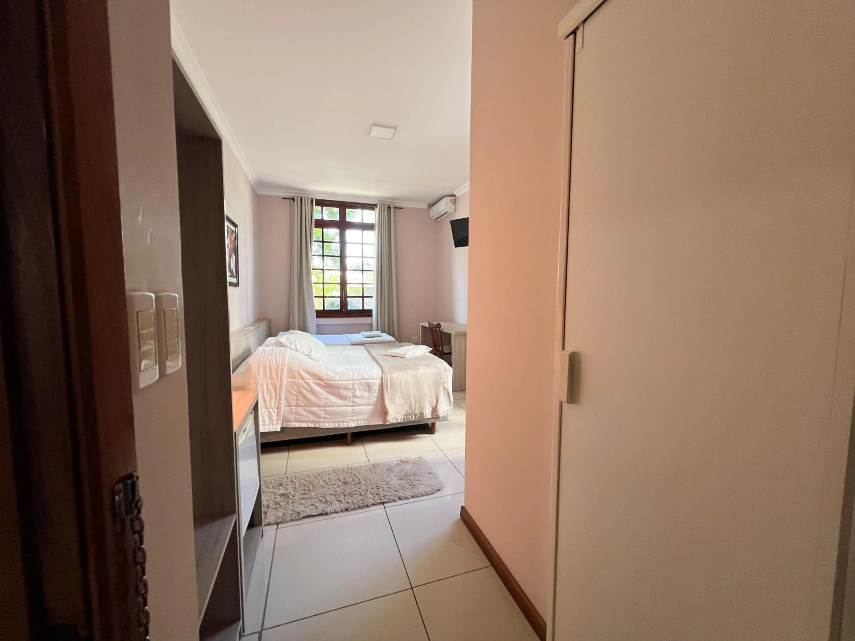 Photo of the whole room, Bed in Hotel Villa Souza Ltda