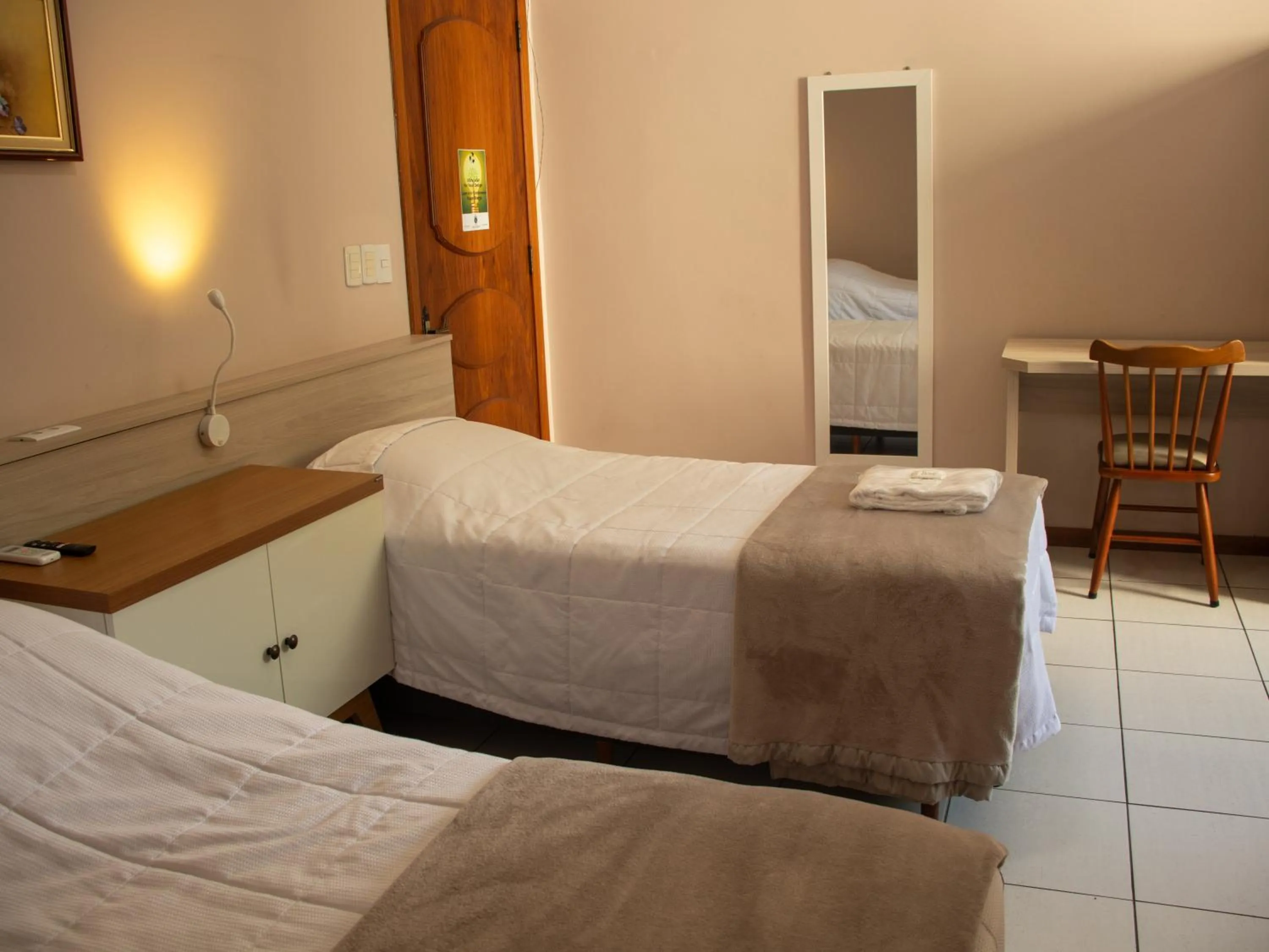 Bed in Hotel Villa Souza Ltda