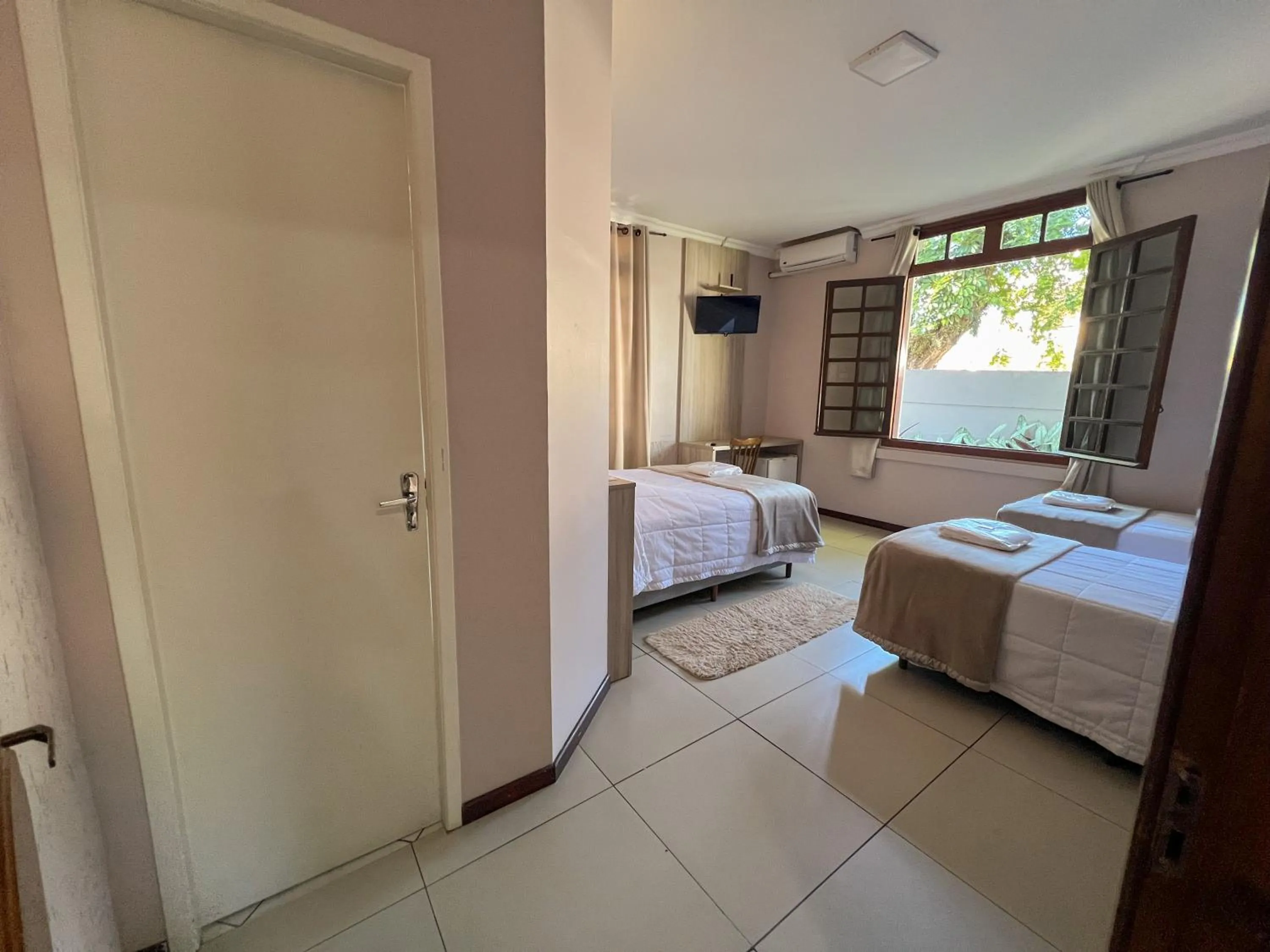 Photo of the whole room, Bed in Hotel Villa Souza Ltda