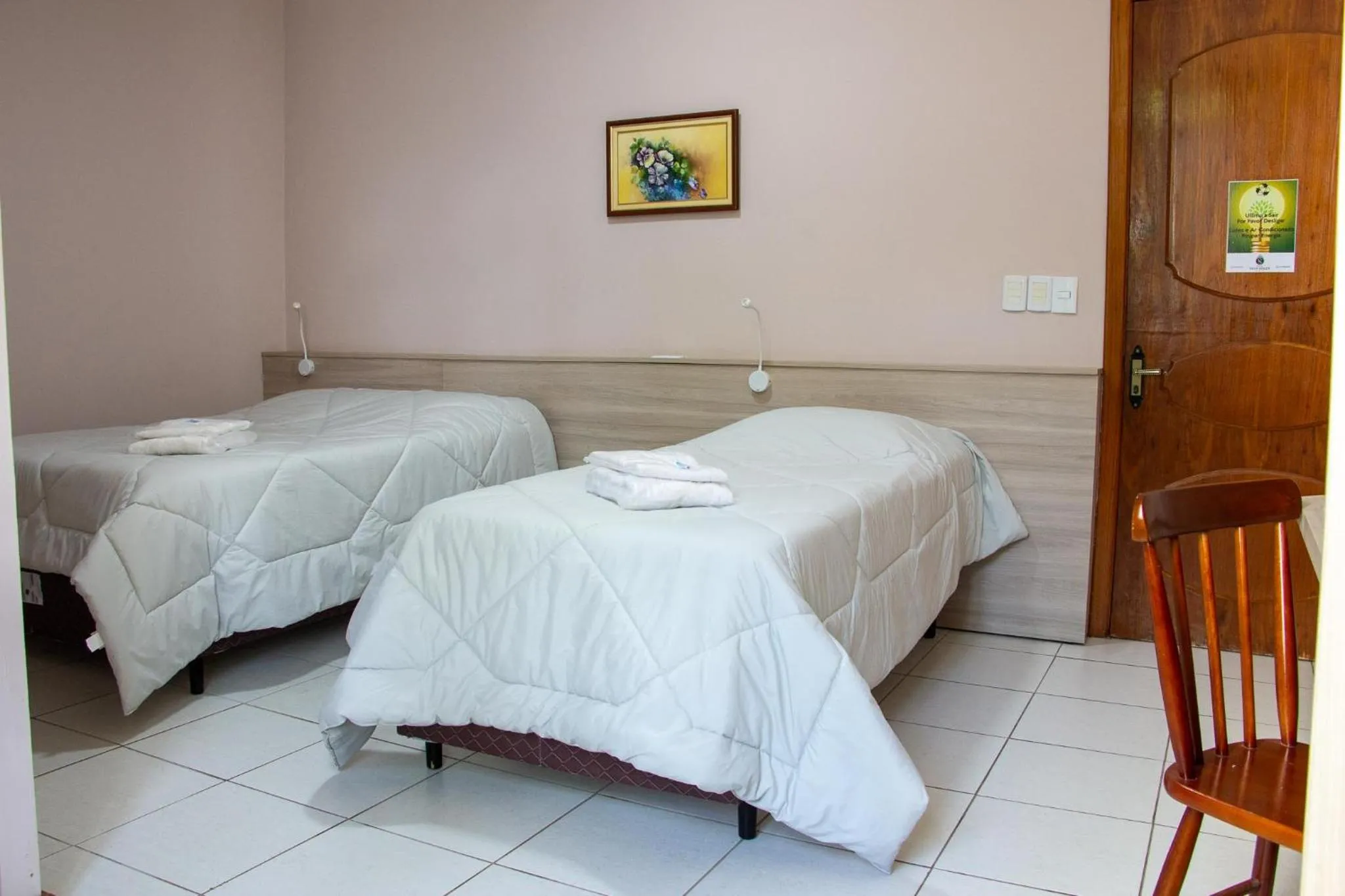 Bed in Hotel Villa Souza Ltda