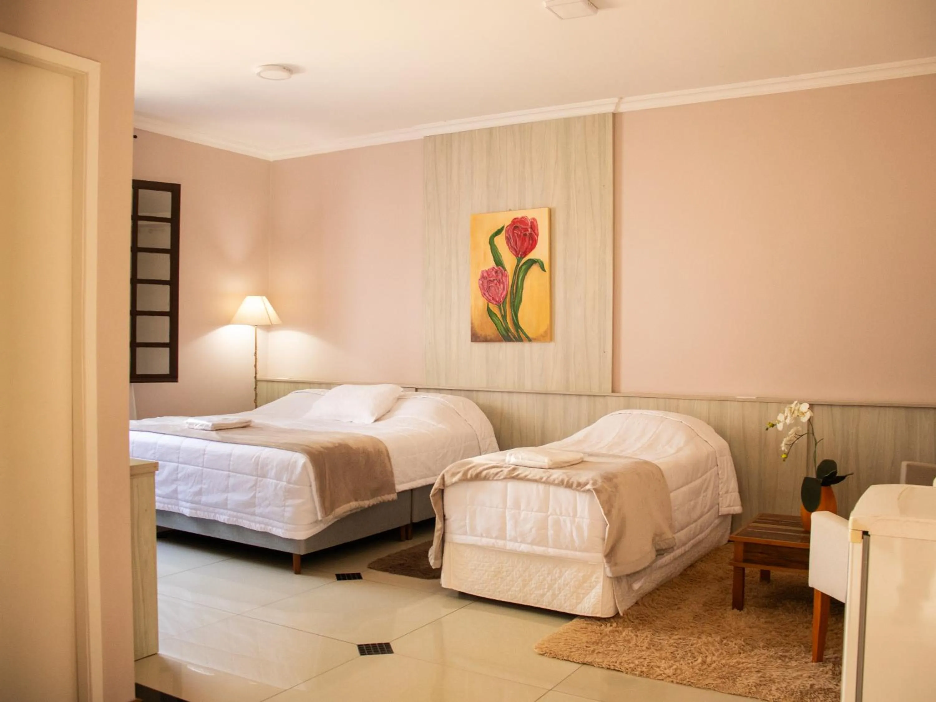 Bed in Hotel Villa Souza Ltda