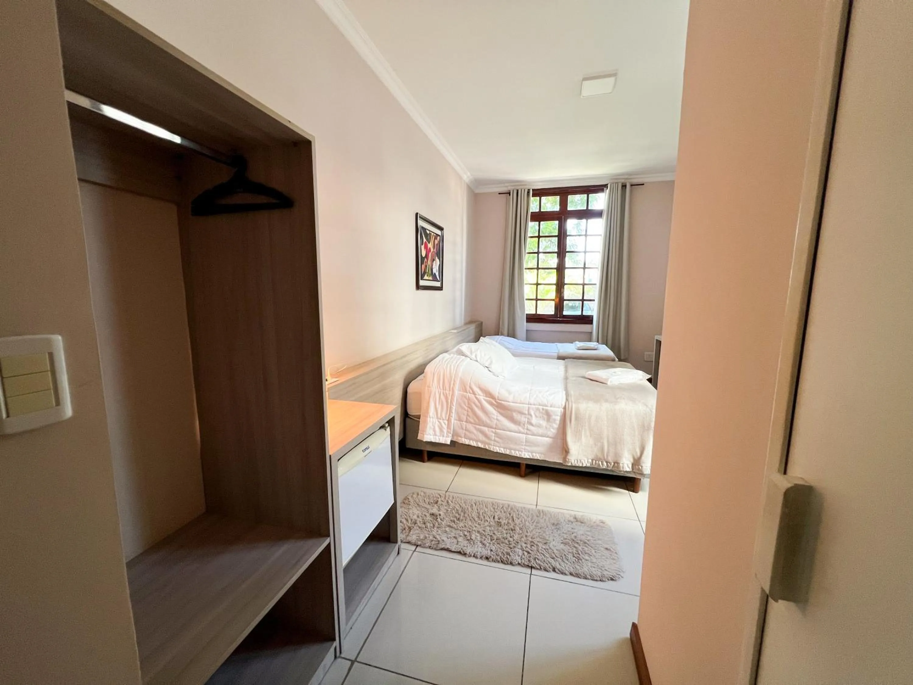 Photo of the whole room, Bed in Hotel Villa Souza Ltda