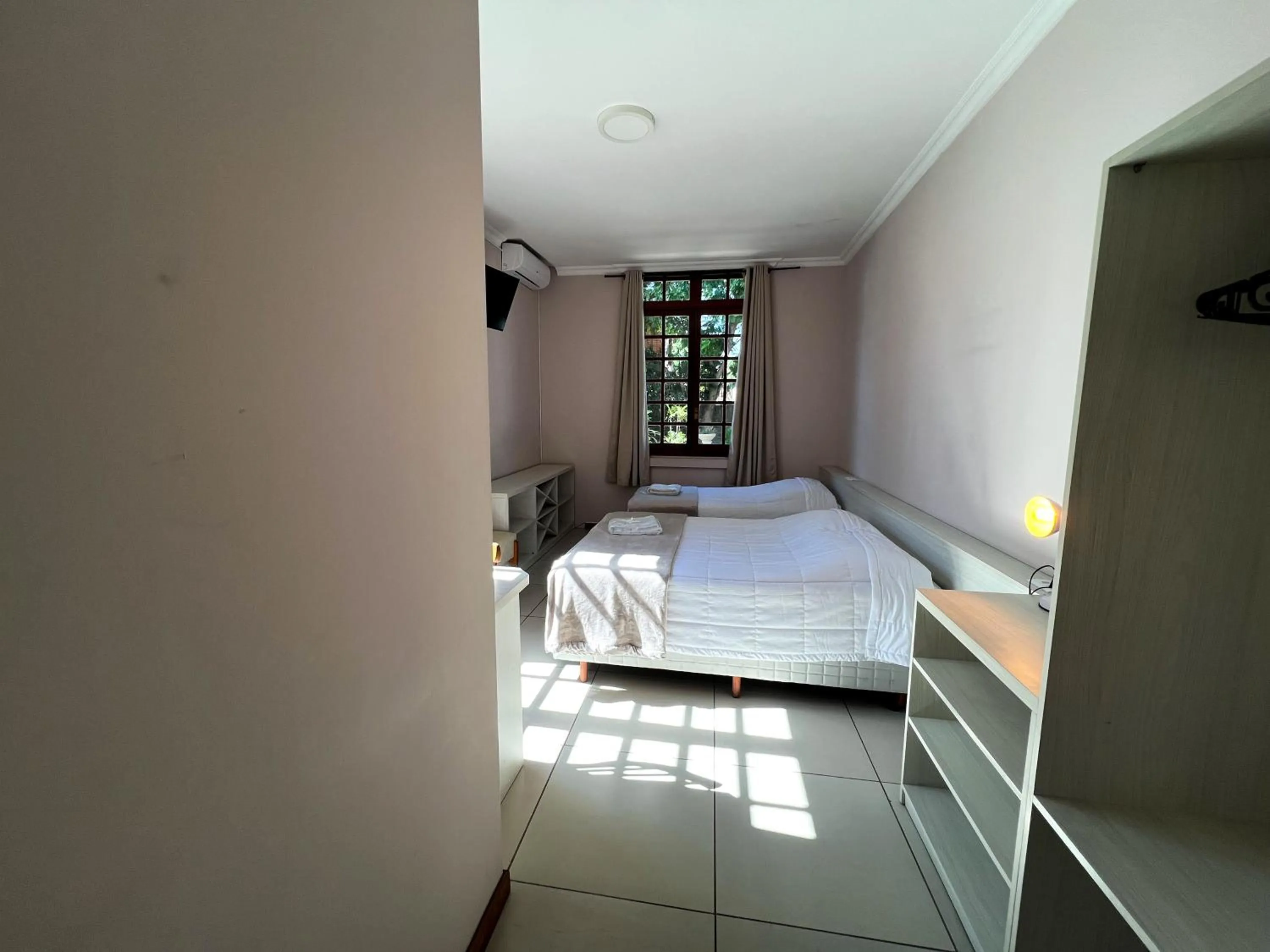 Photo of the whole room, Bed in Hotel Villa Souza Ltda