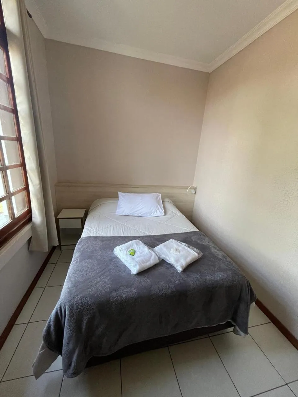 Bed in Hotel Villa Souza Ltda