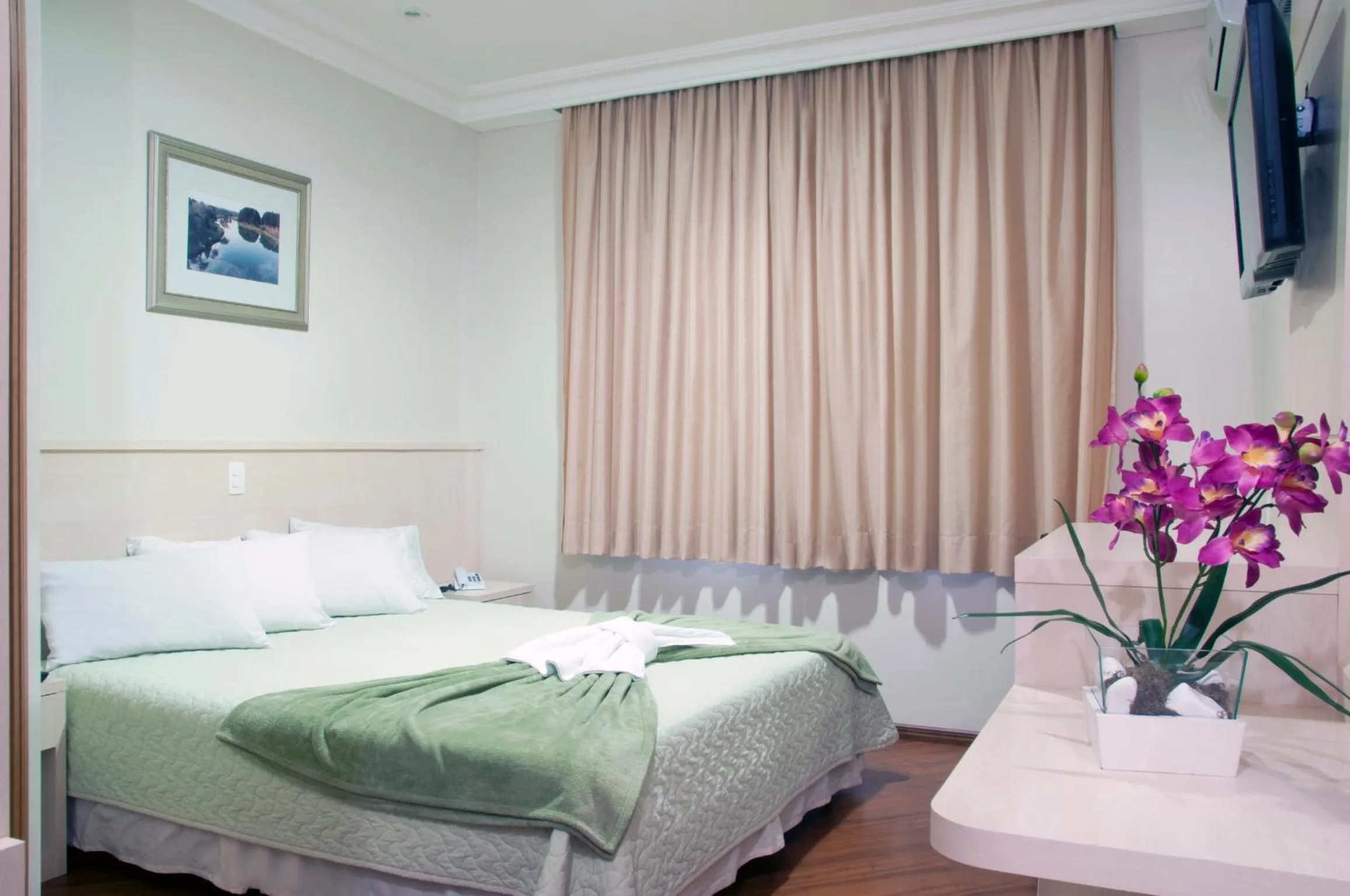 Bed in Grande Hotel Guarapuava