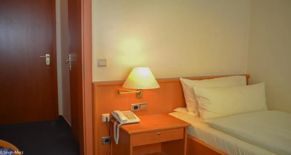 Bed in Hotel Zur Stadt Cassel