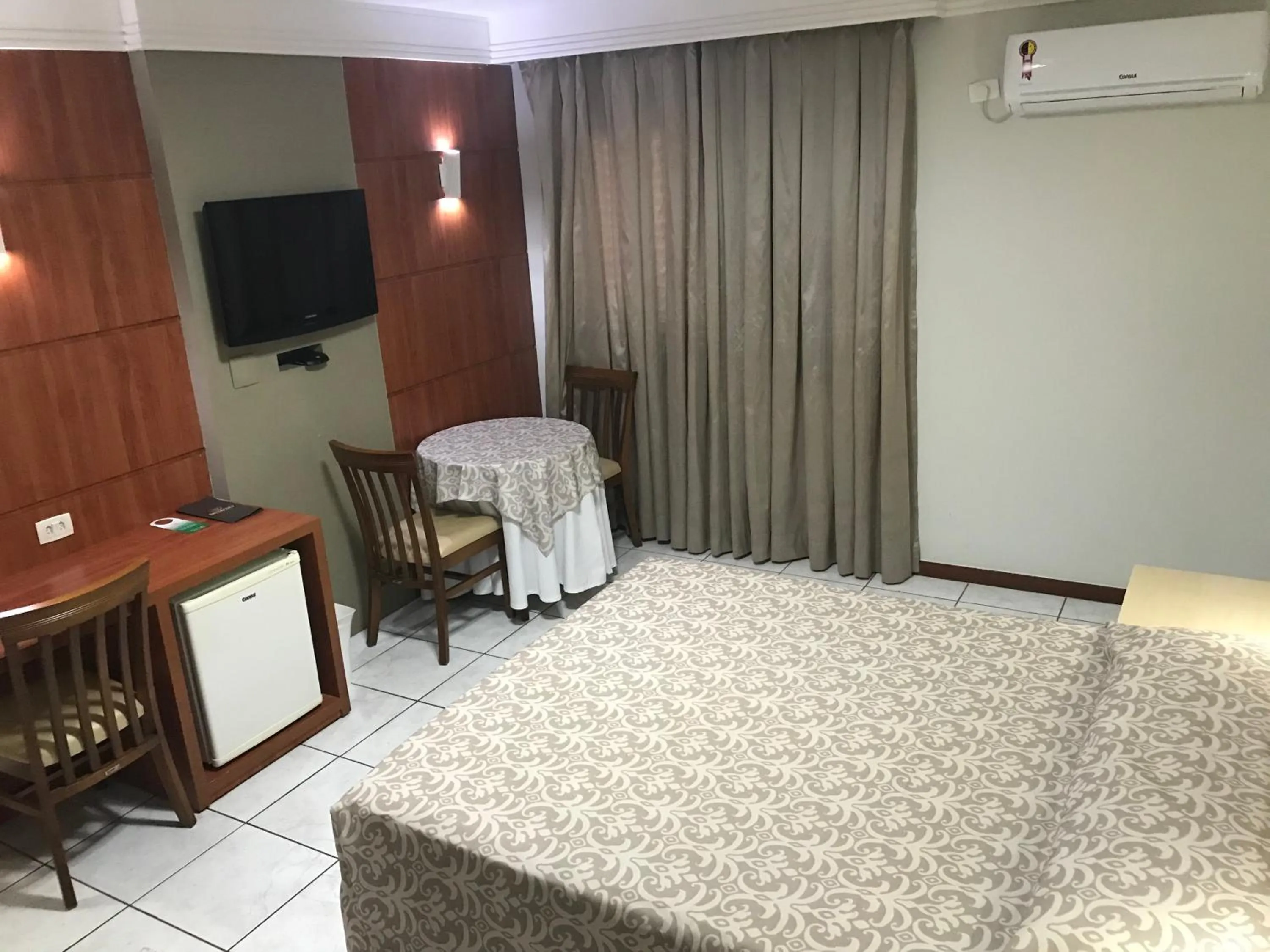 TV and multimedia, Bed in Brumado Hotel