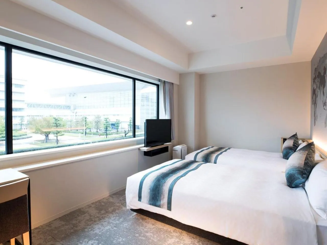 Bed in Centrair Hotel