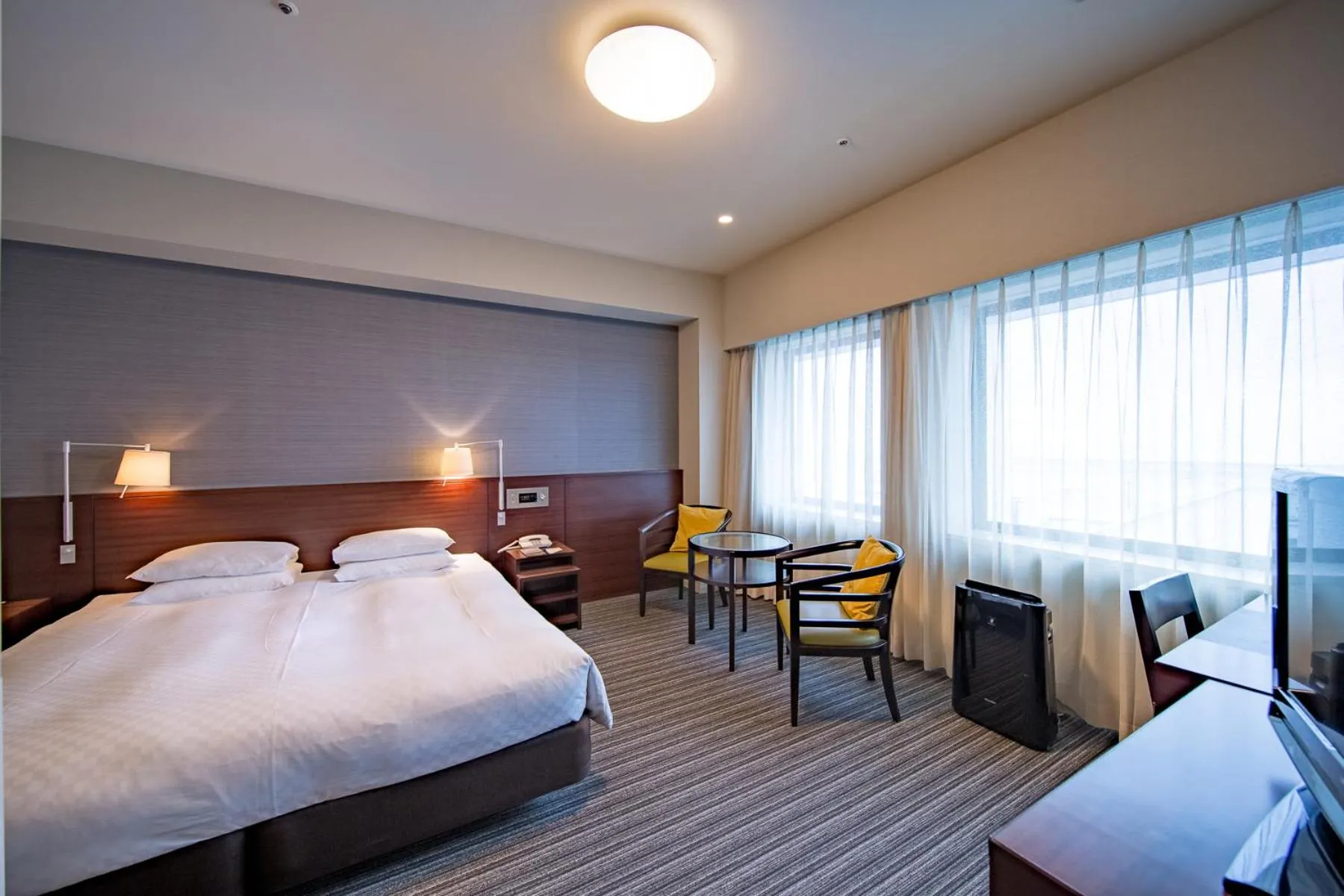 Bed in Centrair Hotel