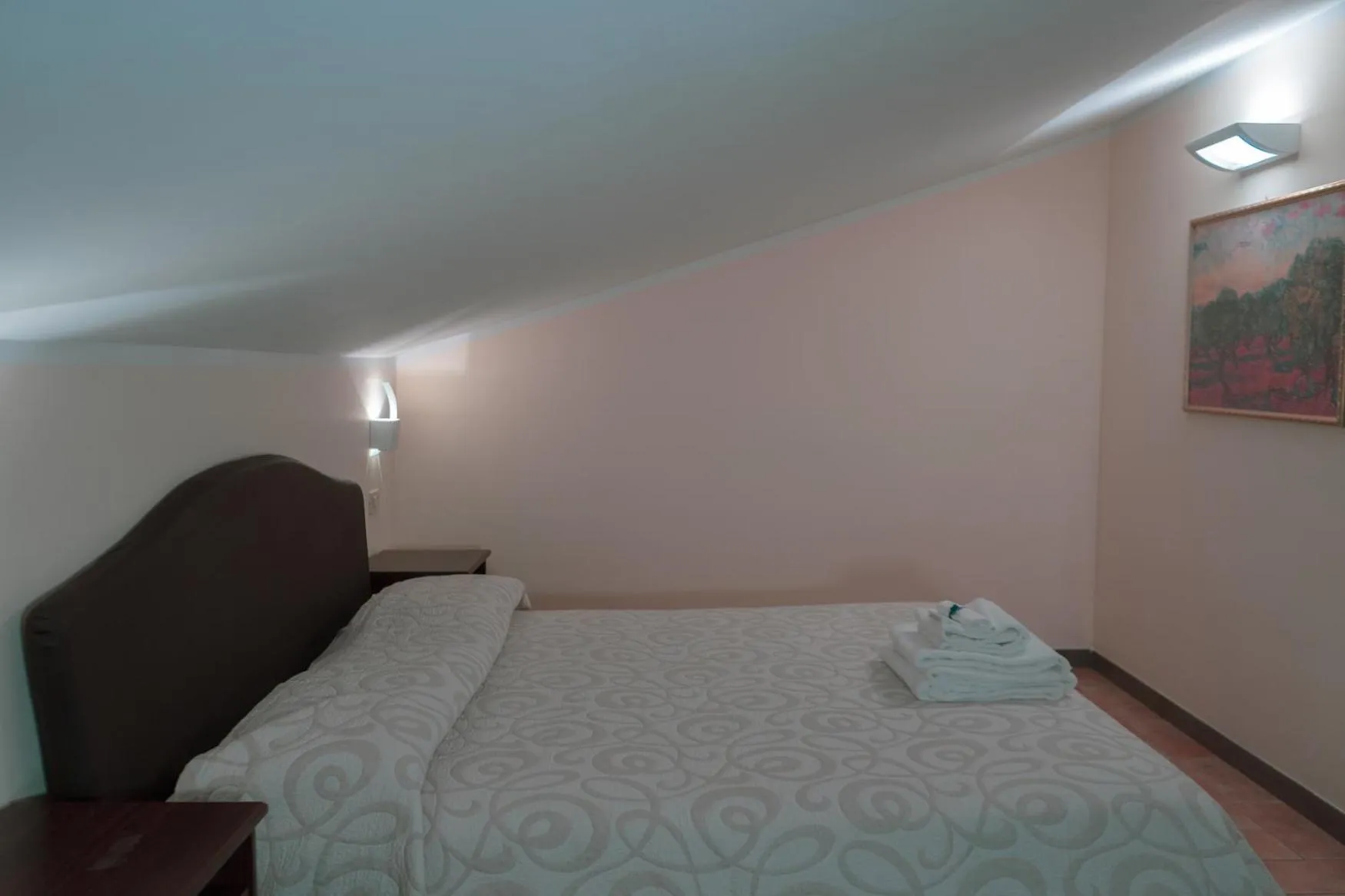 Bedroom, Bed in Carpediem Assisi Living Club