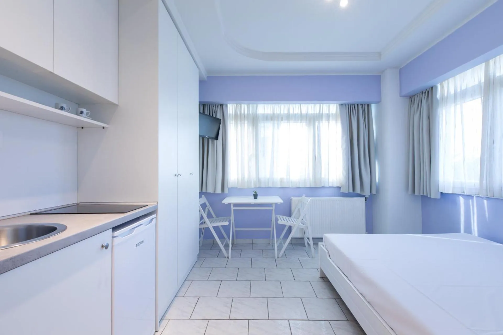 Kitchen or kitchenette, Bed in Hotel Melissanthi