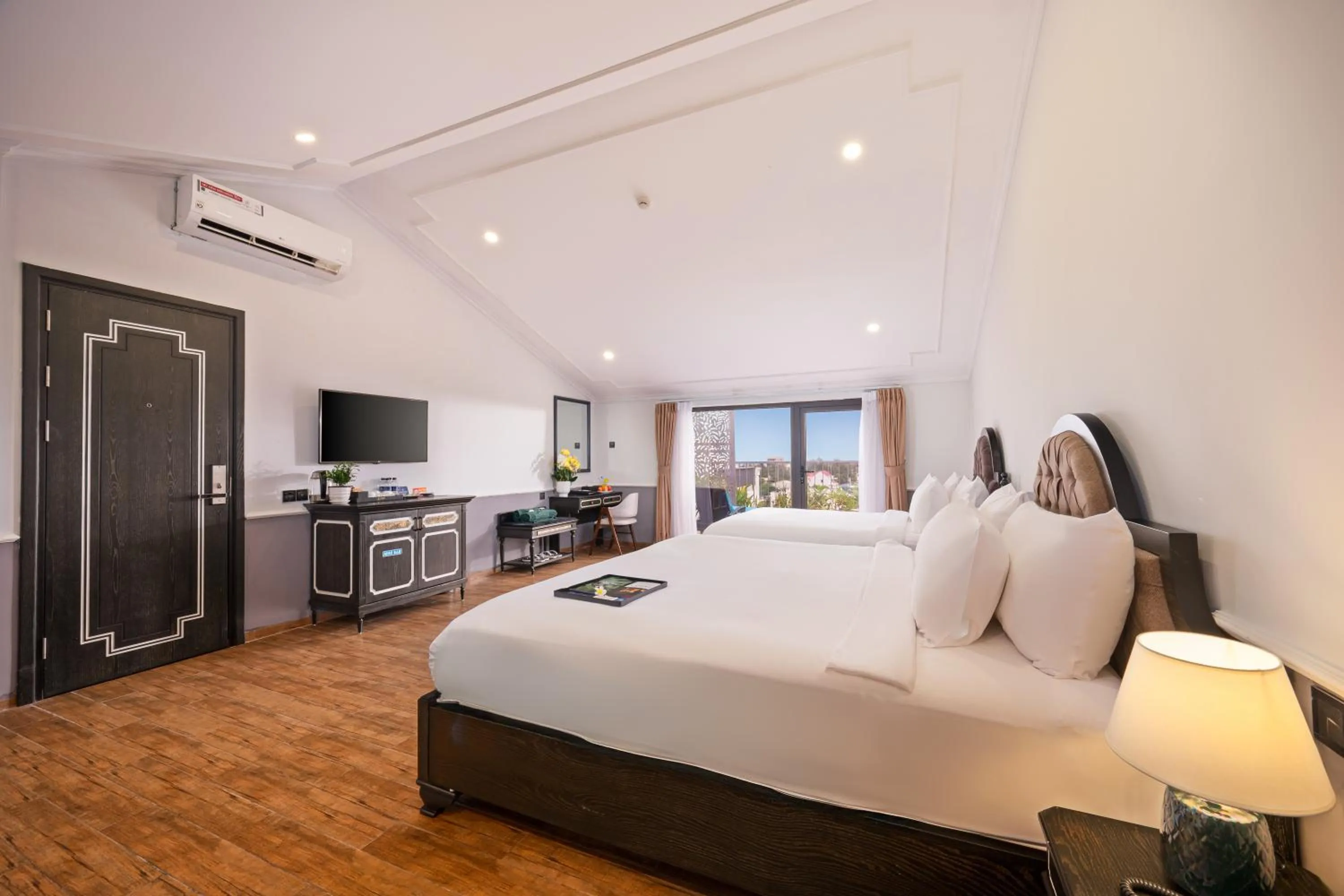 Bed in Athenia Hoi An Boutique Hotel & Spa