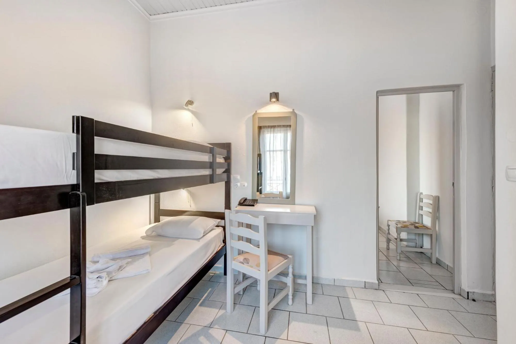 Property building, Bed in Hotel Kamelo