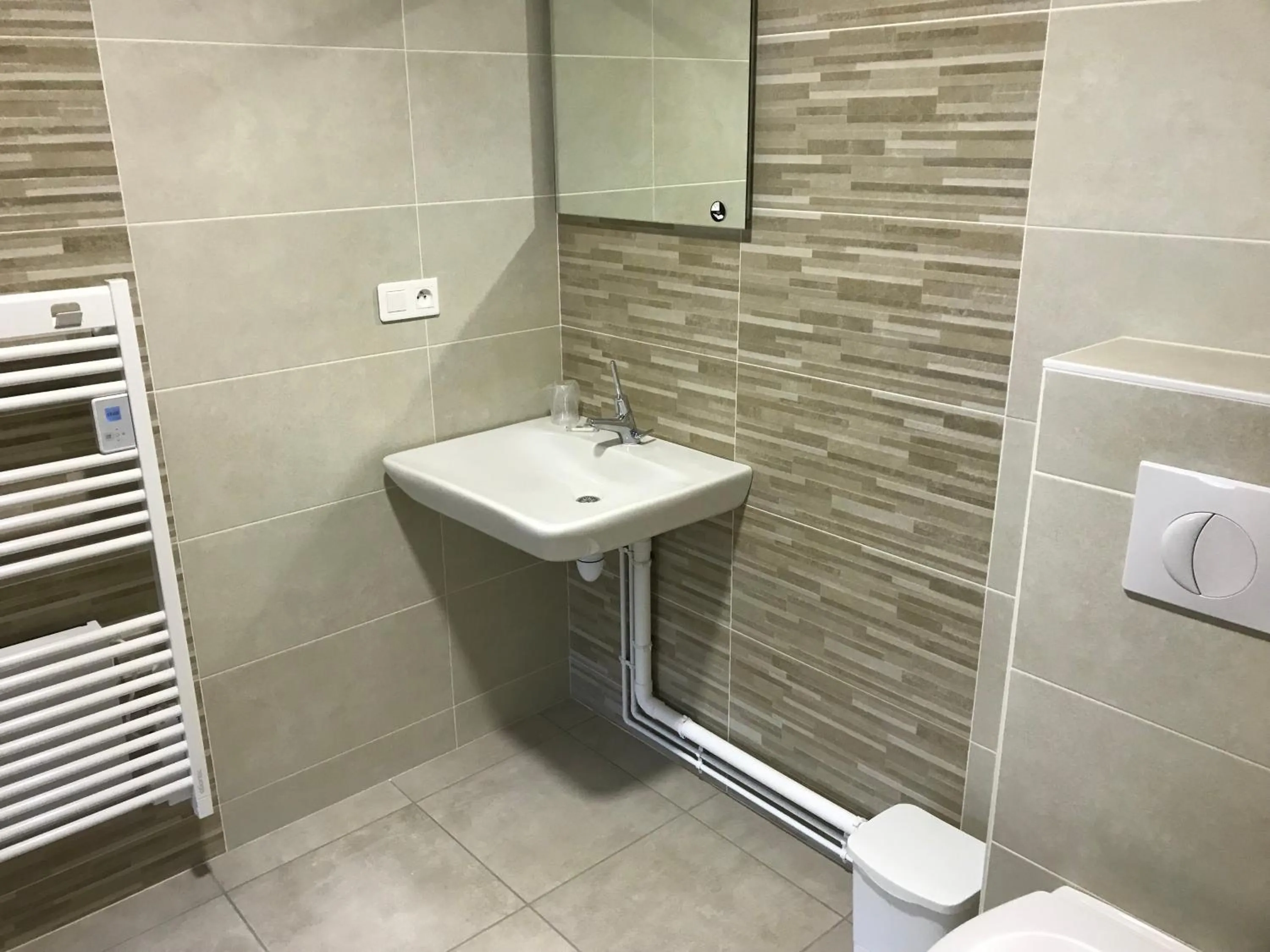 Bathroom in Hôtel Le Cerizay