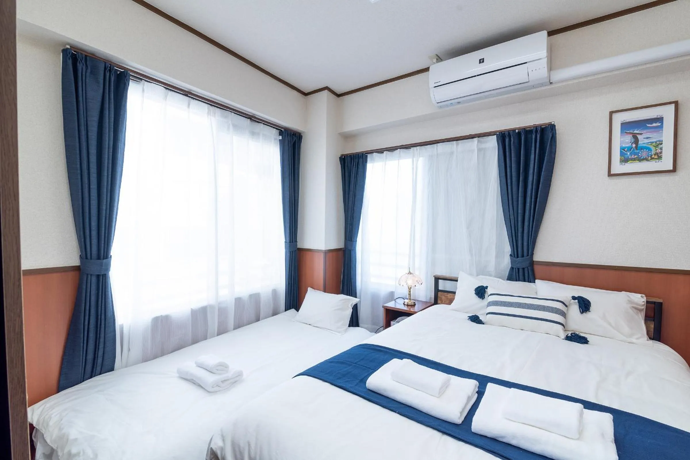 Bed in Uhome Iriya Apartment