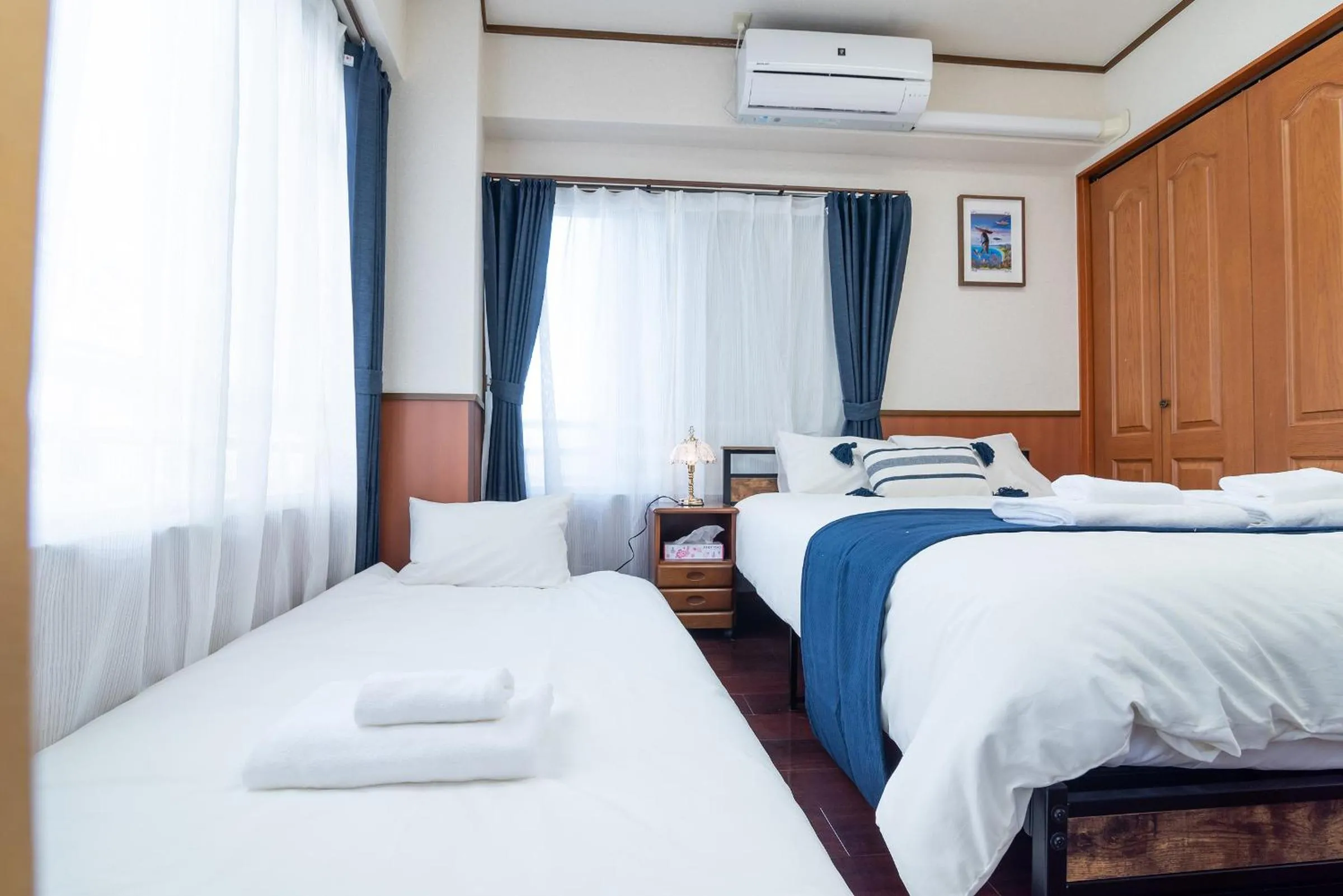 Bed in Uhome Iriya Apartment