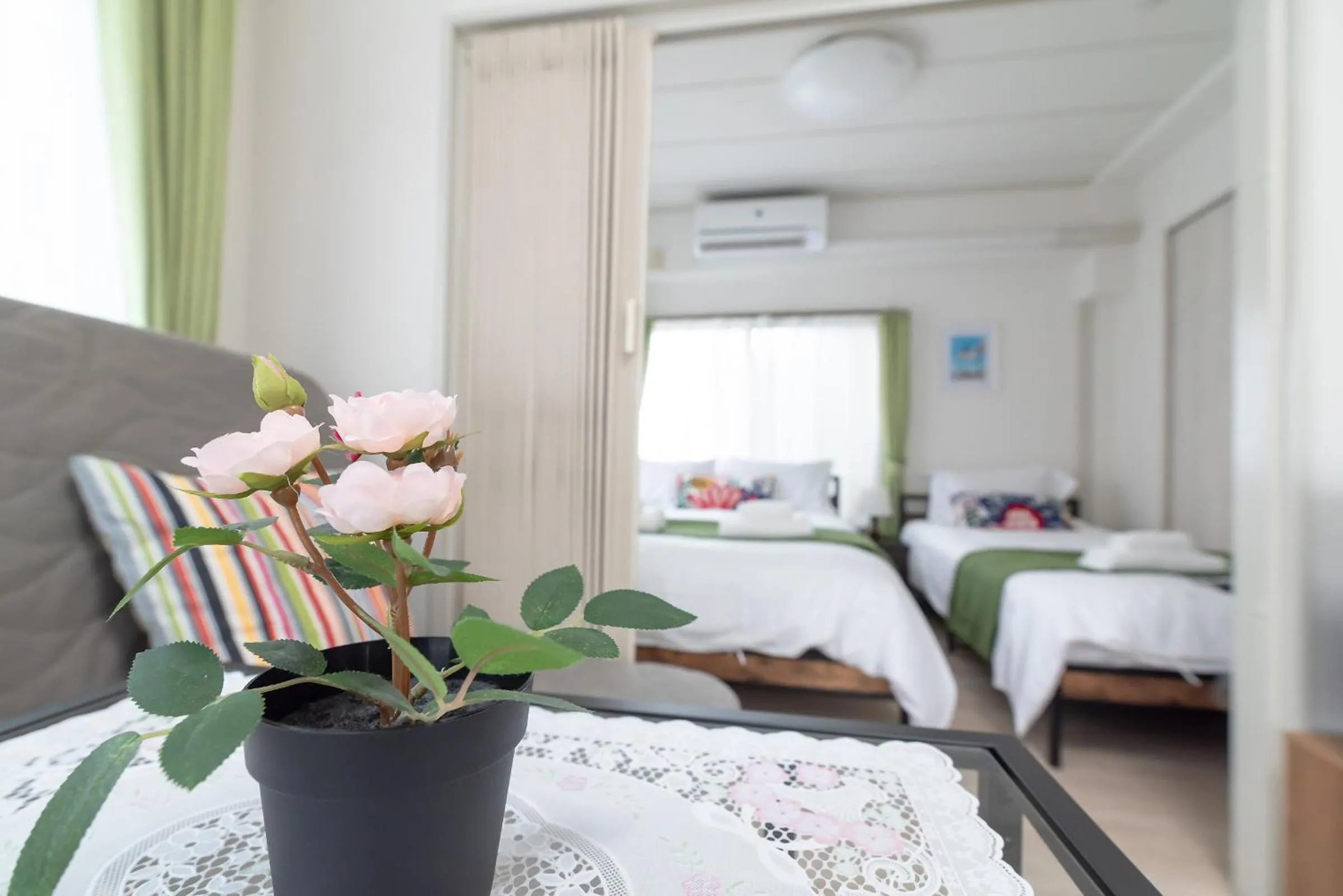 Bed in Uhome Iriya Apartment