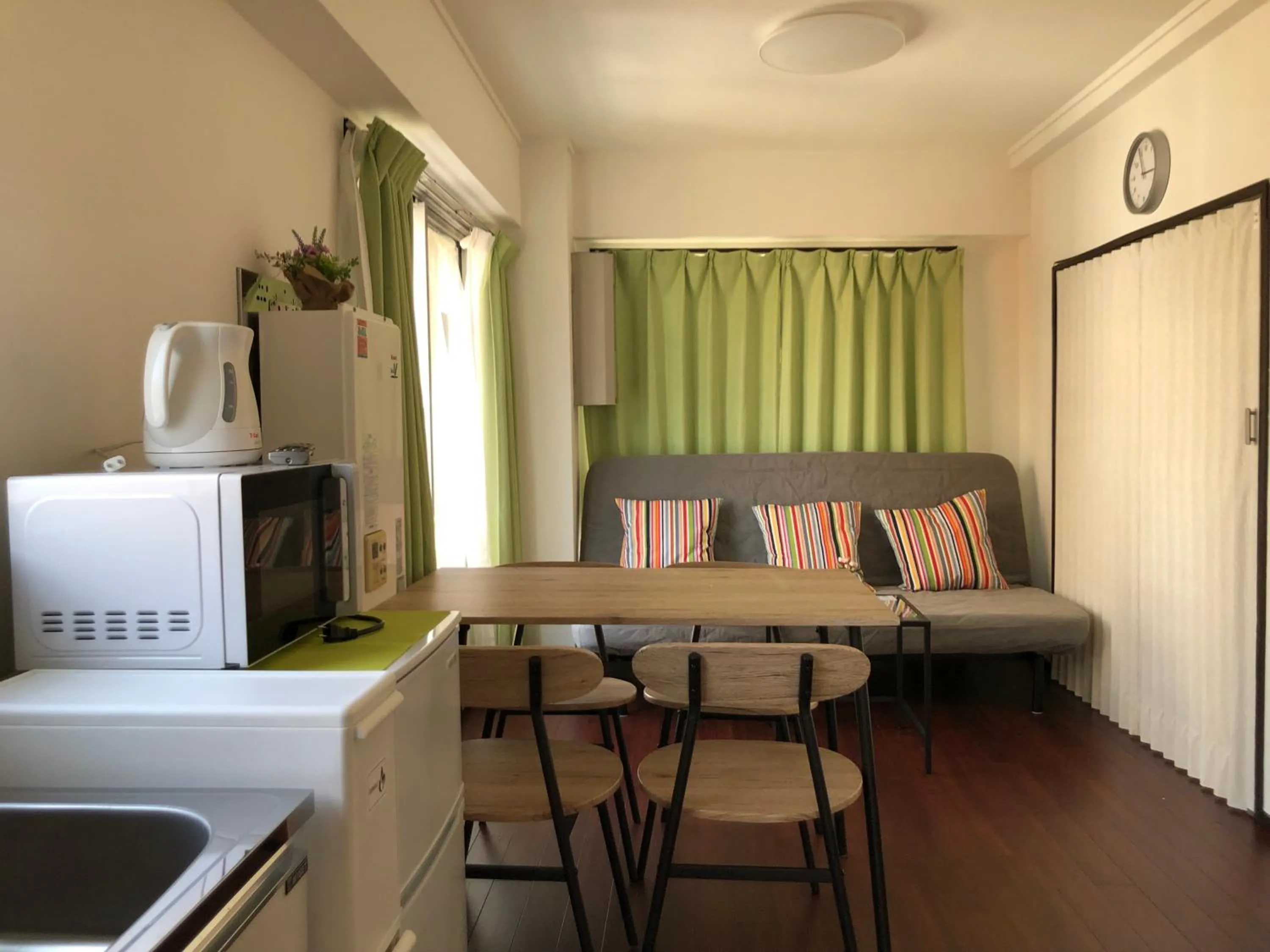 Kitchen or kitchenette in Uhome Iriya Apartment
