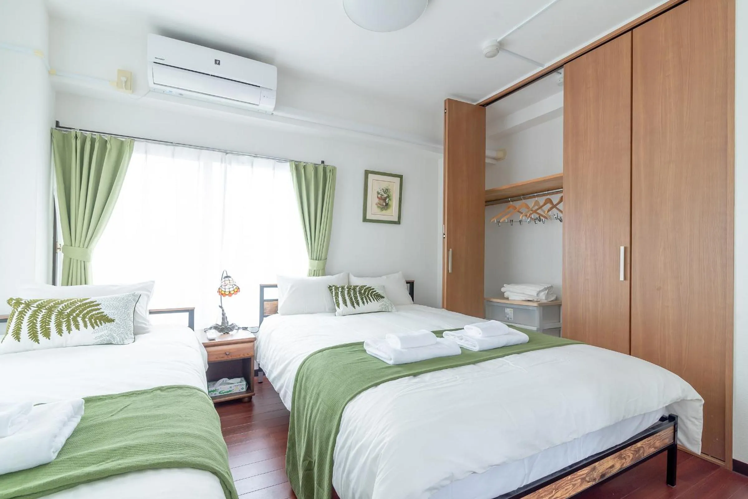 Bed in Uhome Iriya Apartment