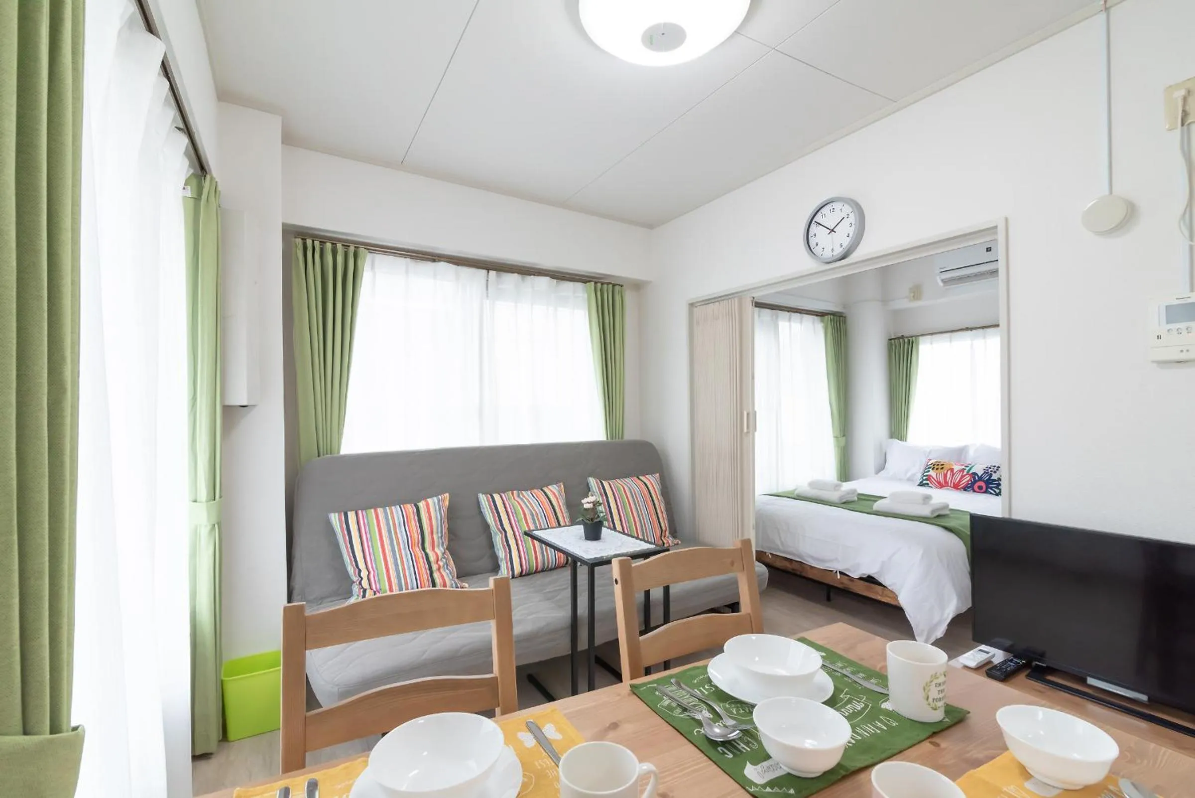 Bed in Uhome Iriya Apartment