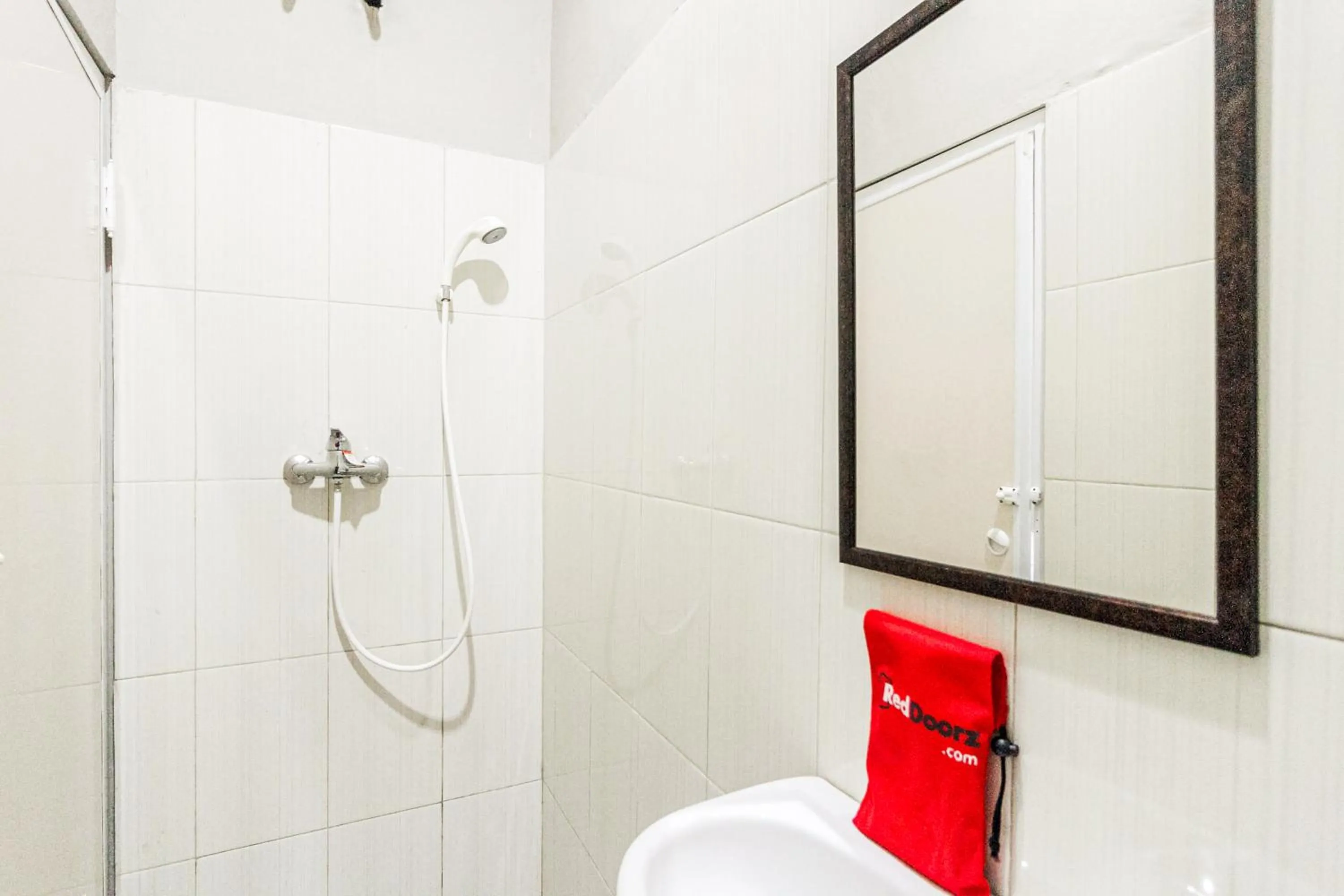Bathroom in RedDoorz near Puri Indah Mall