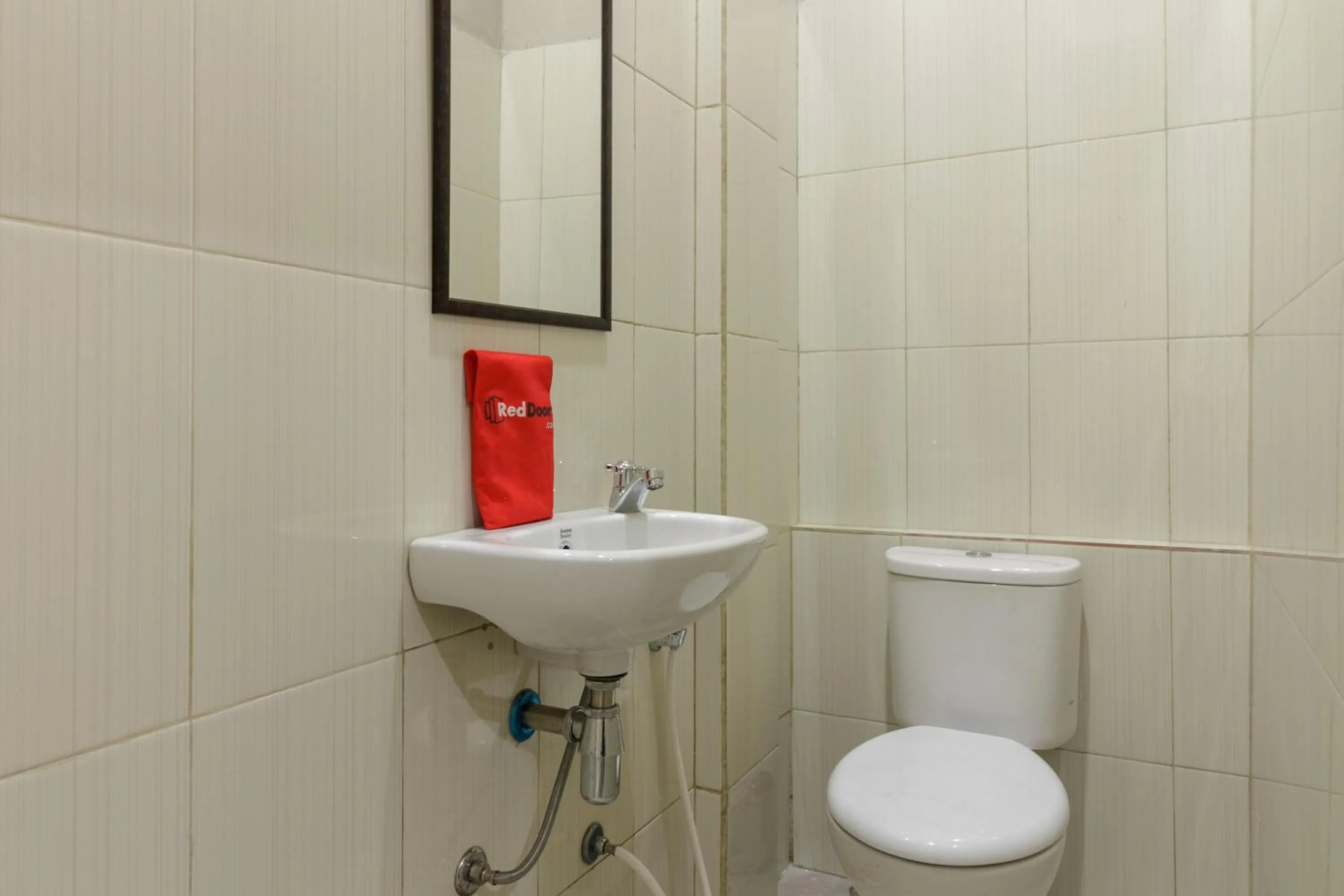 Bathroom in RedDoorz near Puri Indah Mall