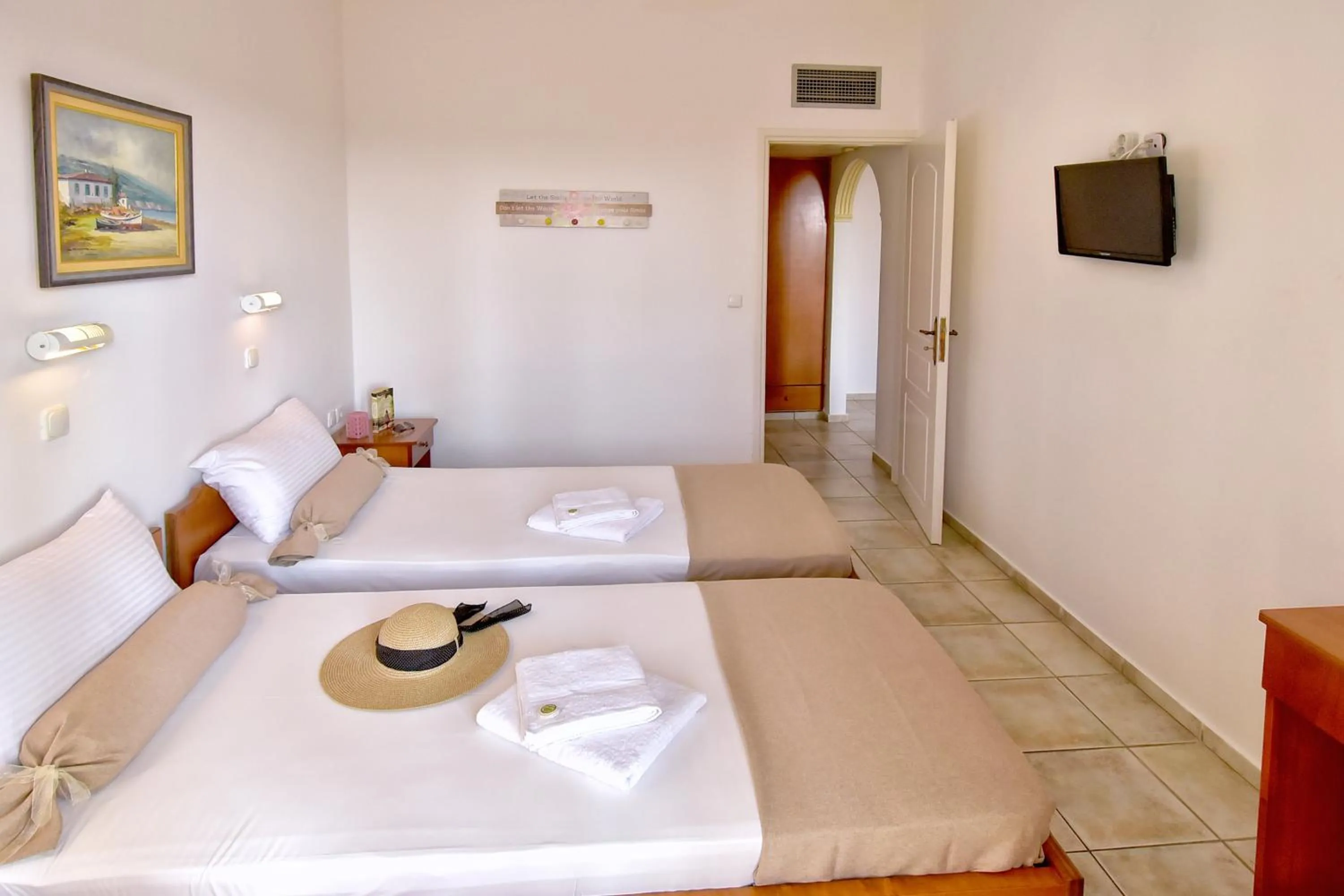 Bed in Aspri Petra Apartments