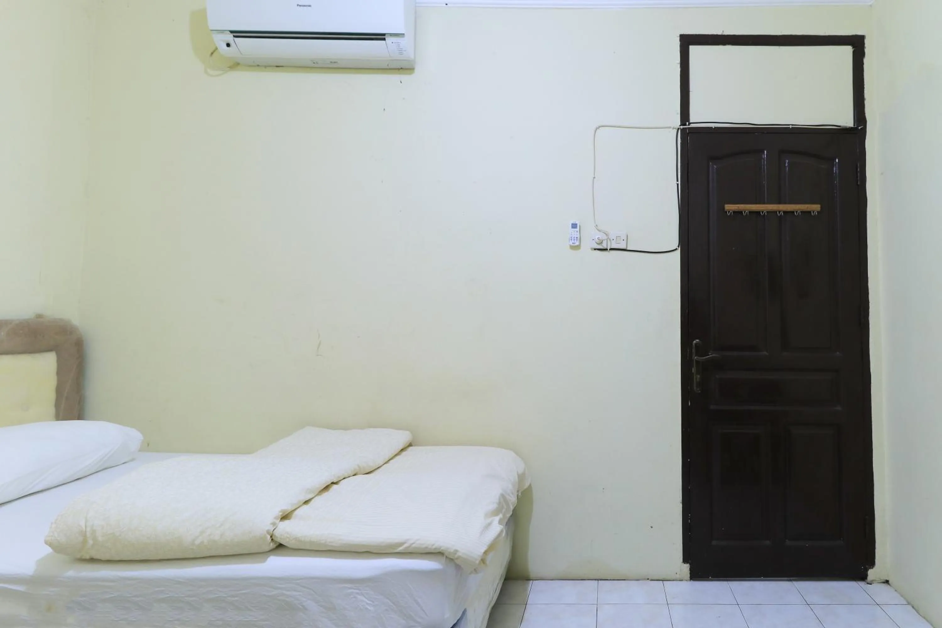 Bed in Guest House Samarinda