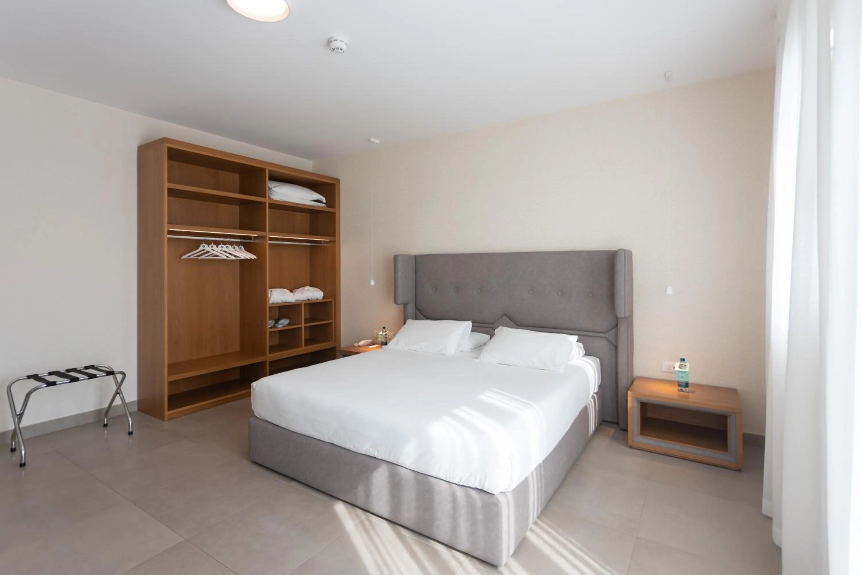 Bed in Mosella Suite Hotel