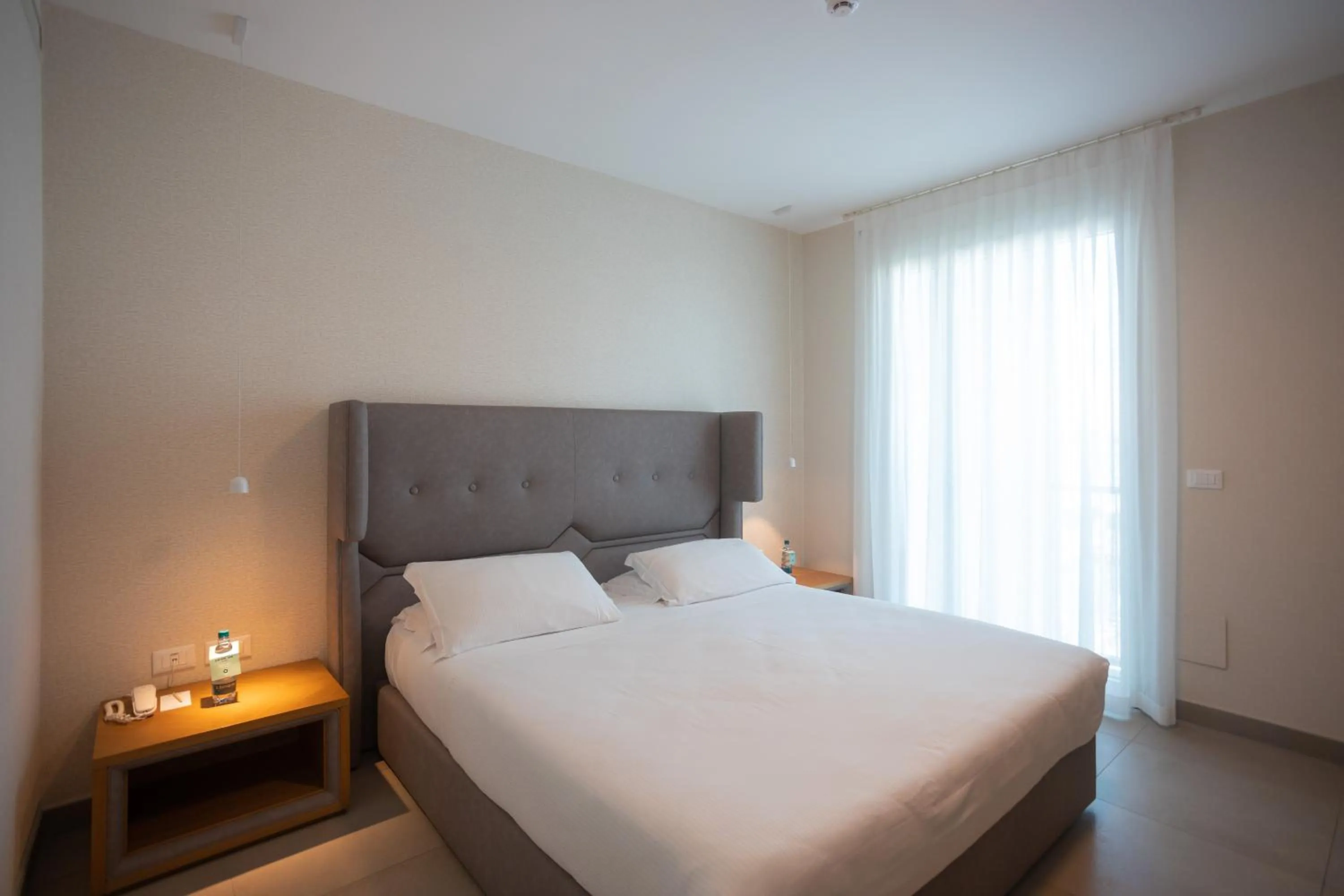 Bed in Mosella Suite Hotel