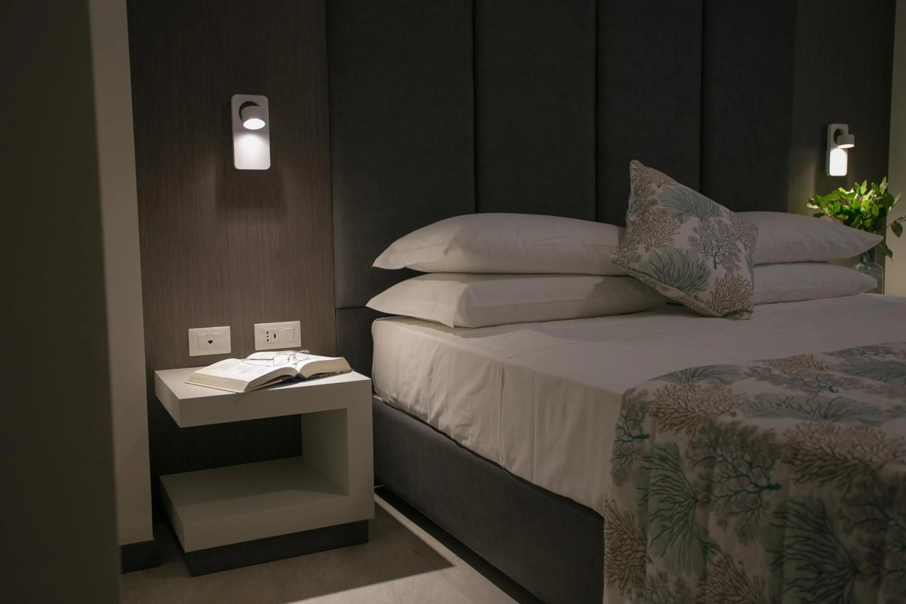 Bed in Mosella Suite Hotel