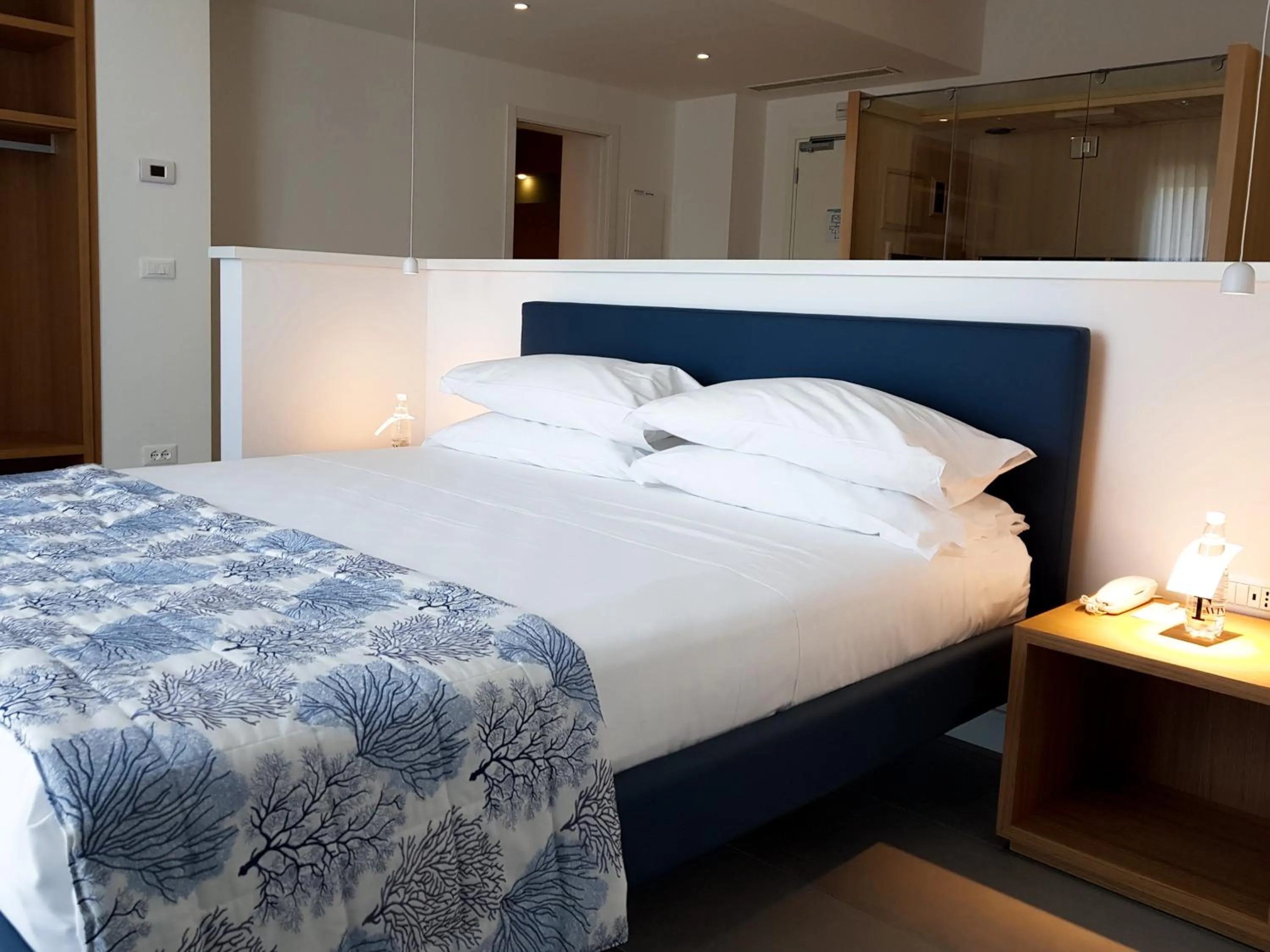 Bed in Mosella Suite Hotel