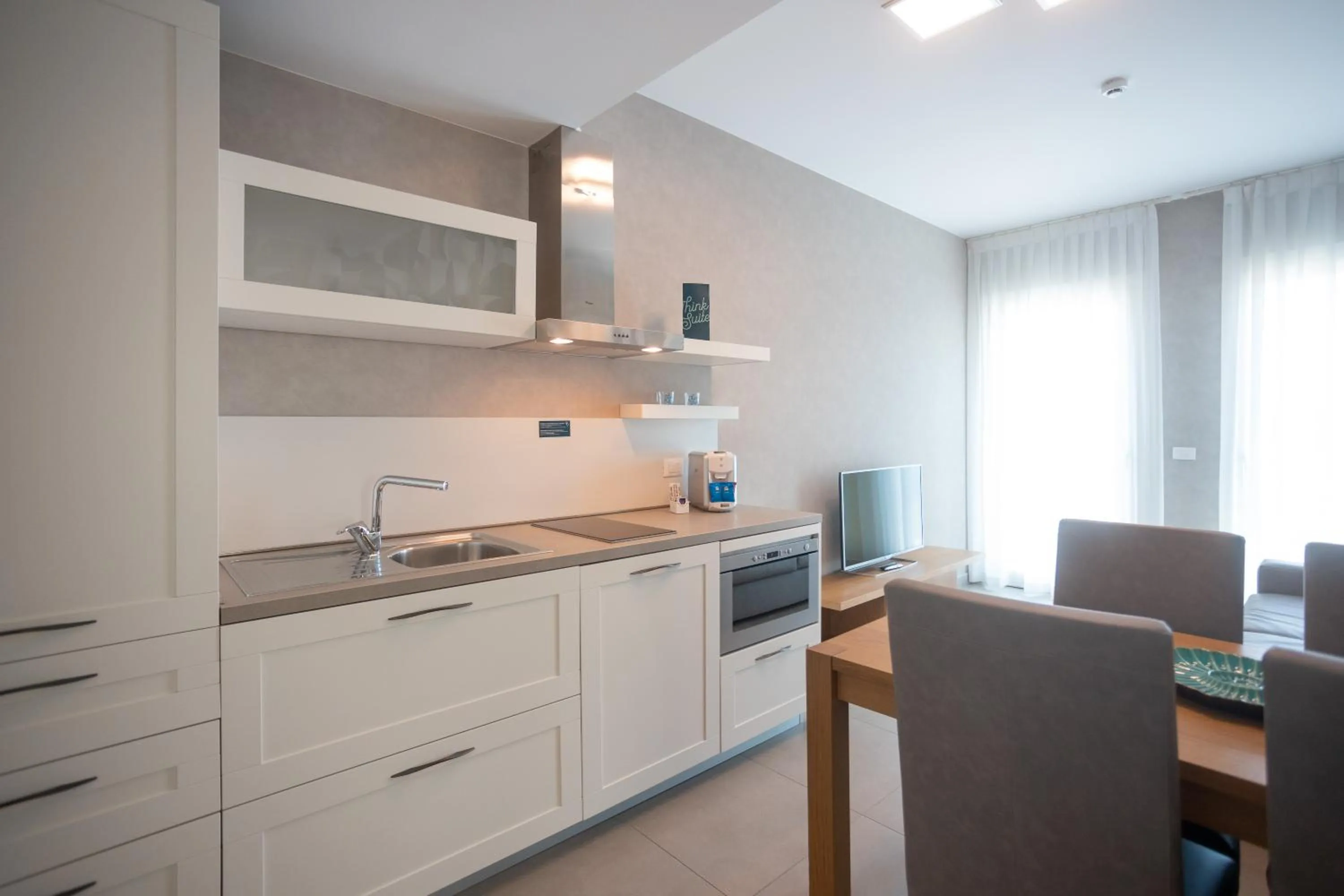 Kitchen or kitchenette in Mosella Suite Hotel